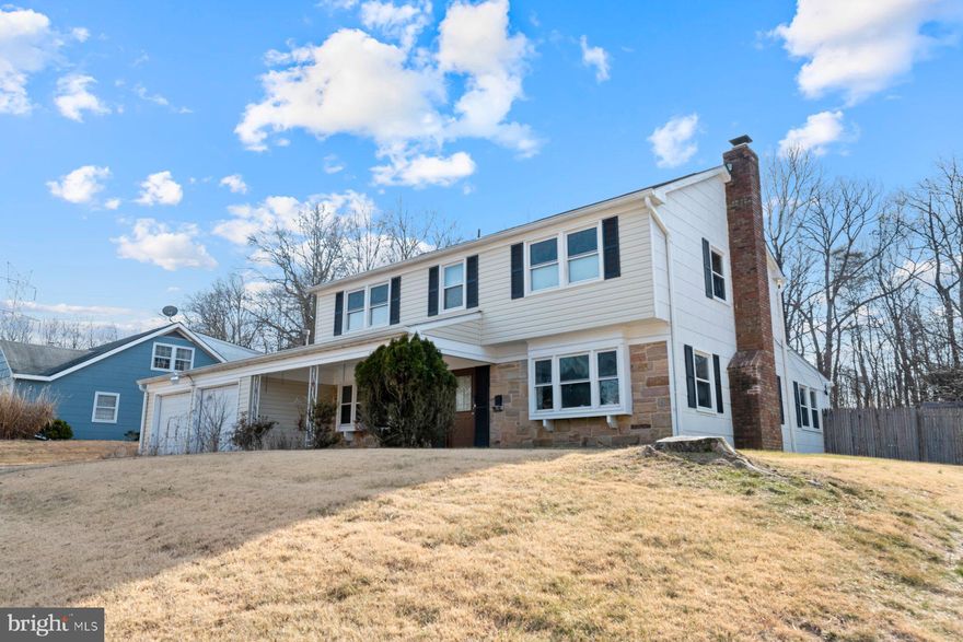 Welcome to 8705 Graystone Lane, a well-maintained 4-bedroom, 2.5-bathroom home situated on a private 0.38-acre lot in the desirable Montpelier neighborhood. Lovingly cared for by the same owners for over 20 years, this home offers spacious living areas, unique features, and an extended family room with a stunning brick fireplace. Looking to bring your own ideas to this spacious, well-maintained home? This is your chance to add your personal touch and make it your own!
The main level features a spacious living room with abundant natural light and a wood-burning fireplace, formal dining room ideal for gatherings, a large family room addition with a charming brick fireplace, and a sunroom leading to the back deck, perfect for relaxation. There is also a main level bedroom, great for guests or an office space, an updated half bath, a laundry/utility room with washer, dryer, and 2019  gas water heater. The kitchen features the original wood cabinetry, laminate countertops, and a tile floor.
The second level features a spacious primary bedroom with a sitting area/nursery space and a remodeled en-suite bathroom. There are 3 additional bedrooms with closets, blinds, and carpeting along with an updated hallway bathroom and linen closet.
You will appreciate the oversized 2 car garage with remote openers that has a recently power-washed floor and an updated electrical panel. The fully fenced backyard that backs to the woods, also features a fenced-in vegetable garden and a storage shed.
Other notable features include new siding in 2024, a 10 year old roof, 5 year old gas furnace & electric AC, and windows have been replaced for energy efficiency. PLUS, the current VA loan at 2.25% can be transferred to a new VA buyer!
Home is being sold strictly AS-IS. Any remaining furniture or personal items left by the seller will be conveyed with the home. Seller prefers a settlement date at the end of April.
Don’t miss this fantastic opportunity to customize and modernize a home with great bones in Montpelier! Schedule your showing today.