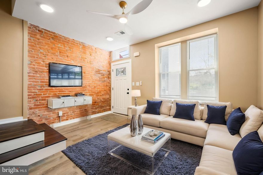 Welcome to 2227 N 17th St, a fully renovated stunner in the heart of Philly, just a few blocks from Temple University. This one checks all the boxes. From the moment you walk in, you’ll notice the attention to detail. LVP flooring runs throughout the home, setting the tone, while  brick accent walls add just the right touch of character to the living room and beyond. The kitchen? Clean and modern, featuring 36" white shaker cabinets, onyx quartz counters, stainless steel appliances, subway tile backsplash, and gold accents that pop. It’s the kind of space that makes you want to cook...even if you don’t. Upstairs, you’ll find three spacious bedrooms and two full bathrooms, including a primary suite that feels like something out of a design magazine. Sleek black fixtures, pristine tile work, and thoughtful finishes make every bathroom feel like a retreat. Need more space? The fully finished basement includes another full bath and the flexibility to use it as a fourth bedroom, guest suite, home office, or gym. The upgraded electric panel, central air, and updated hardwood stair treads round out the list of upgrades, and the private backyard features a brand new horizontal wood privacy fence, perfect for relaxing or entertaining. This is some of the best renovation work I’ve seen in the city. The craftsmanship shows from top to bottom. And let’s talk location, you’re just minutes from Temple’s main campus, which makes this a great option for all. Close to Broad Street, public transit, parks, and growing development all around, it’s a smart buy in a neighborhood that keeps leveling up.  This is one worth seeing in person. Let’s set up your tour today.