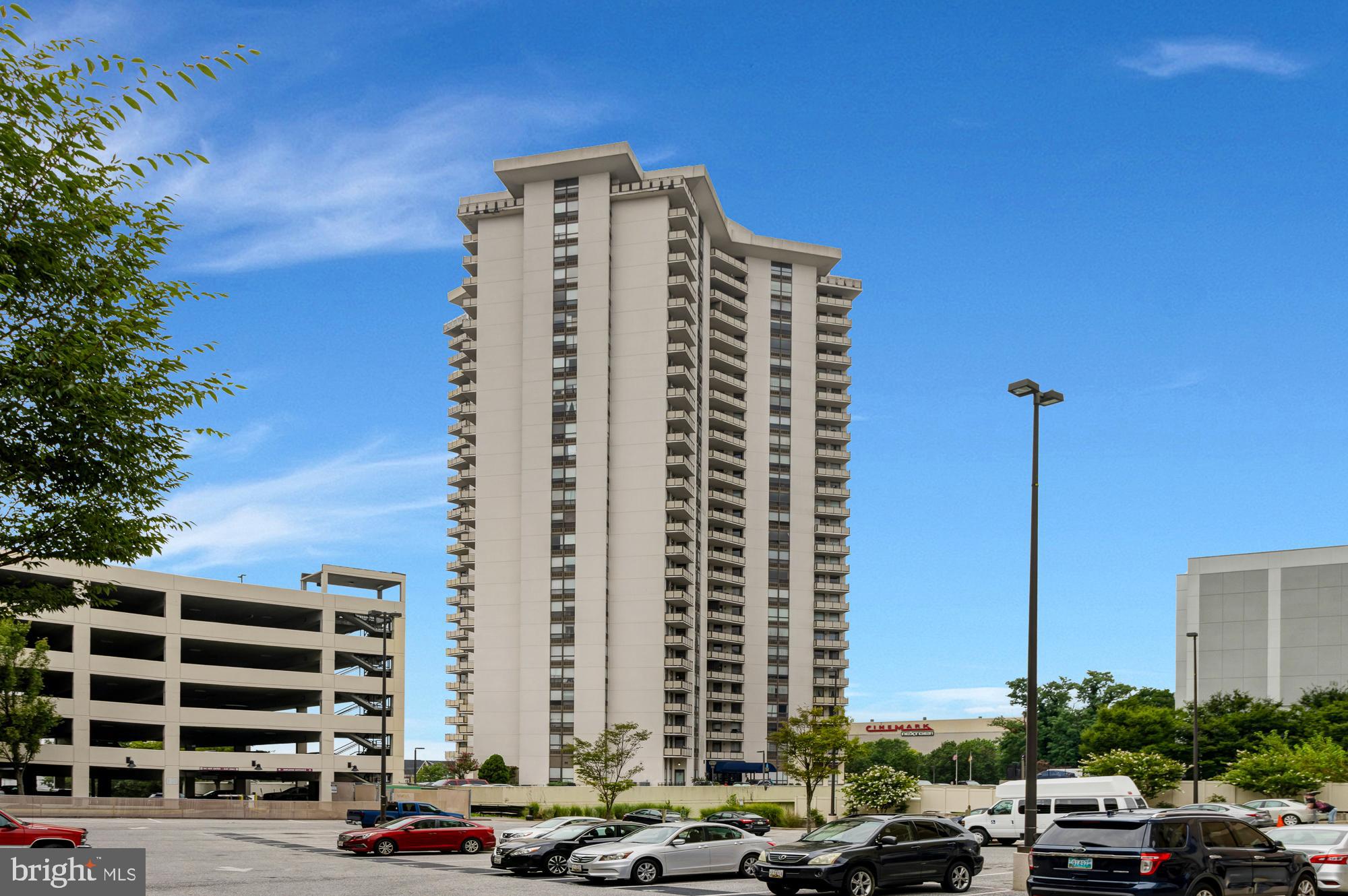 Welcome to this Beautifully Updated 2BR-2Bath Corner Unit in the 27th Floor That Checks All the Boxes!! The View Is Spectacular in Multiple Directions Offering Some of the Best Views in Baltimore County of the Downtown Skyline & the Far-off Bay to the South East Plus the Sunsets to the West- This Condo Unit has the Largest Floor Plan with 1450 Sq. Ft. of Living Space & Comes with TWO Deeded Parking Spaces G55 & G56+Plus a Storage Cage Located in the Garage-The Unit Has Brand New Wood-look Luxury Vinyl Plank Flooring in the Living Room/Dining Room Area & New High Quality Wall to Wall Carpet in the Bedrooms Plus the Unit is Freshly Painted & Has new Light Fixtures-Enjoy the Convenience of Having a Full Washer & Brand New Dryer-This Largest Model Corian Kitchen Will Easily Fit a Table & Chairs-The Updated Bathrooms have Nice Shower/Bath Tubs & Vanities with Storage-Both Bedrooms Have Walk-in Closets + An Extra LG Foyer Coat Closet & LG Storage Closet in the Hallway-The Condo Fees Includes Many Items Including Your Electricity & Heating / Cooling Expenses-Your Hot & Cold Water-24 Hour Security-Front Desk Attendant-3 Elevators-A Beautifully Renovated LG Outdoor Pool-An Exercise Room & Party Room + So Much More!! Make an Appointment Today to See This Beautiful Condo!