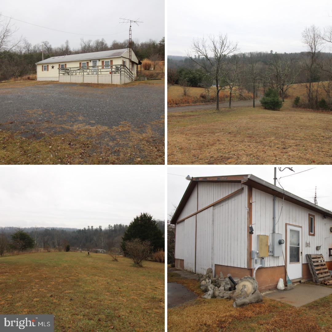 BACK ON THE MARKET AT NO FAULT OF THE SELLERS! Welcome to 1185 Butts Mill Road! Here is your chance to get your slice of wild and wonderful West Virginia! The Beautifully maintained home has so much to offer! The first is a stunning 3 Arce lot with NO HOA with lots of potentials! Walk up onto the 10x24 front deck into this 3 bed 2 full bath home which features updated flooring! Sit out on the 8x46 back deck and ensure the surrounding views! This home also offers a 1254 sqft garage/workshop with a wood stove and a half bath! The outside storage sheds and containers convey as well! Call today for your showing this gem will not last long!
Please note this is a single-wide trailer with an addition, please verify with the lender to ensure no issues with financing!
