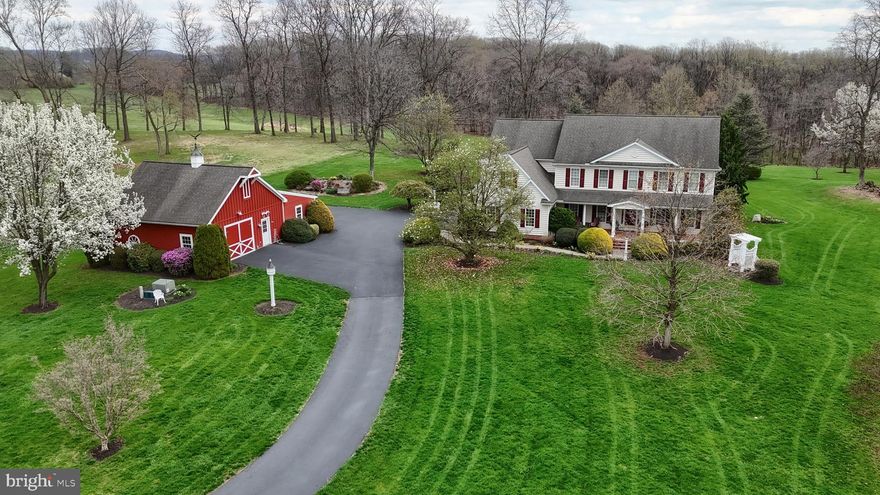 Welcome to your own secluded retreat on 10 breathtaking acres of professionally manicured grounds—so stunning, you’ll feel like you’re strolling through Longwood Gardens.
This custom-built home offers 4 spacious bedrooms and 3.5 baths while boasting a first floor bedroom with full bath on the main level and a Primary bedroom ensuite on the 2nd level, thoughtfully designed for both comfort and elegance.  Enjoy an impressive array of features including all hardwood and tile flooring, a spacious formal dining room with tray ceiling, formal living room with gas fireplace, an impressive 2 story great room with gas fireplace, exuding an abundance of natural light. Two conveniently located staircases with one welcoming you as you enter the front door and the other accessed from the kitchen leading to a dedicated office with built ins. The beautiful conservatory that brings the outdoors in,  boasts Italian tile flooring,  remote blinds, it's own dedicated heating zone, and might become your favorite place to relax. Other features include front and rear covered porches with composite decking, a maintenance free gazebo, 5 garage spaces, a heated worksop with 2nd floor storage, superior wall foundation, 4 zone propane heating and cooling system, Meticulously maintained, this home boasts updated and professionally serviced mechanical systems, giving you peace of mind and true move-in readiness. 
If you’ve been searching for privacy, luxury, and unmatched natural beauty—this is it.

Information though believed accurate is not guaranteed.