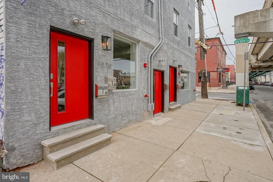 1070 N Front Street is a fully renovated mixed-use property featuring a first-floor commercial space with a private entrance and access to a full basement. The building includes two residential units: Unit A: 1 Bed / 1 Bath and Unit B: 2 Bed / 1 Bath. Both kitchens feature stainless steel appliances, tile backsplash, and quartz countertops. Each unit has separate electric service. Taxes and square footage is the responsibility of the buyer to have verified independently.