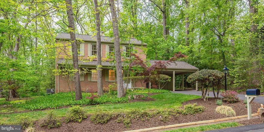 The spirit of Reston welcomes you to this cul-de-sac sanctuary; newly renovated contemporary with vaulted-ceiling screened porch and all the promises of “live, work, play and preserve” that balancing modern life with nature deliver. As you enter the gracious foyer your eyes are drawn through the home to the lush grounds and the windows that seem to bring the outdoors in. Stunning hardwood floors on main and upper levels are newly refinished & the elegant wood staircase and banister are a beautiful contrast. The kitchen, newly renovated with functional design (2026) with all new stainless steel appliances, new LED recessed lighting, center island with sink & dishwasher for ease of use. Designer tile backsplash, quartz countertops and gorgeous mixed wood cabinetry create a rich and inviting space for cooking & entertaining.  Cohesive design style with antique brass cabinetry hardware, contemporary light fixtures and mid-century modern touches sprinkled throughout. 
In the hall coat closet you’ll find a mounted pencil sharpener from decades past that has served many little hands. Hardwoods continue upstairs through the 4 generously sized bedrooms. Fully renovated primary bathroom with custom, Zellige tile walk-in shower, console sink & antique brass stand, upgraded and designer fixtures and faucets. Renovated hall bath with whimsical, boho tile flooring and sleek, floor to ceiling subway tile shower. New vanity, fixtures, faucets and mirror. New toilets in all bathrooms and an old-school laundry chute between the bedrooms!
Formal dining room just off the kitchen with sliding glass doors onto the private and understated deck. Deer, fox and bunnies wander through the idyllic yard enveloped by flora & fauna and a birdwatcher’s paradise. Wood, platform deck newly refreshed and painted is an extension of the home to the outdoors and to the protected preservation land behind the property.  Three, gentle steps down to the grass with direct access to the Turquoise trail (which runs behind/parallel to the house) with  wildlife, hyacinth & bluebells spilling into the garden.
The oversized screened-in porch with vaulted ceiling &  drop-ceiling fan is the crowning jewel of this spectacular home. Enjoy hours of entertaining, reading, gatherings, meals and relaxation in this extraordinary addition which can be accessed both from the front &  back of the home. Between the carport and the porch the attached storage shed provides plenty of space for tools, toys and tackle.
The Lower Level rec room has all new recessed lighting and wood burning brick fireplace with raised hearth and wood mantle. Cozy and inviting with new carpeting this warm space has endless potential with approximately 487 sq ft of unfinished space to expand the rec room, add a bathroom or create an office or guest’s den. Through the freshly painted utility room with brand new laundry sink & faucet, you’ll find the oversized and walk-in cedar lined closet for sustainable storage of all items and apparel. Cedar closet also has new carpeting. Workshop bench and personal touches throughout are evident of this home’s beating heart. New roof (2026) and Hot water heater (2026) All windows professionally powerwashed.Close proximity to all that Reston has to offer! Access to all Reston Pools, tennis courts, dog park, biking and walking trails, Convenient to all major commuter routes (Lawyers Rd, West Ox, 267-Dulles Toll Road, Rt. 28 and 286-Fairfax County Parkway). Convenient to Dulles and mins from Wiehle & Reston Metro Silver Line Metro Station. Reston Town Center just 3.5 miles from your front door, with fine dining, shops and restaurants, seasonal ice rink, musical and arts performances and community activities. Minutes to Lake Audobon and Lake Thoreau with miles of walking & bike trails, camping and outdoor activities. Surrounded by community parks and nature trails and just over 2 miles to Reston National Golf Course. Reston is calling!