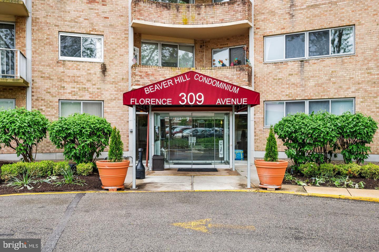 Welcome home to this 2 bedroom, 2 full bathroom condo in beautiful Beaver Hill. Feel the safety around you in the completely secure building! This unit is one of the larger 2 bedroom units with hardwood flooring in the living room, dining room and hallway. Galley kitchen with granite countertops. There is newer carpeting in both of the nicely sized bedrooms, The 2nd bath has been nicely updated. Lots of storage and closet space! One of the best features is the huge balcony area with lovely views and privacy. You can walk to the train station! Heat, AC and Water/sewer are included in the maintenance fee. Just move in and unpack!