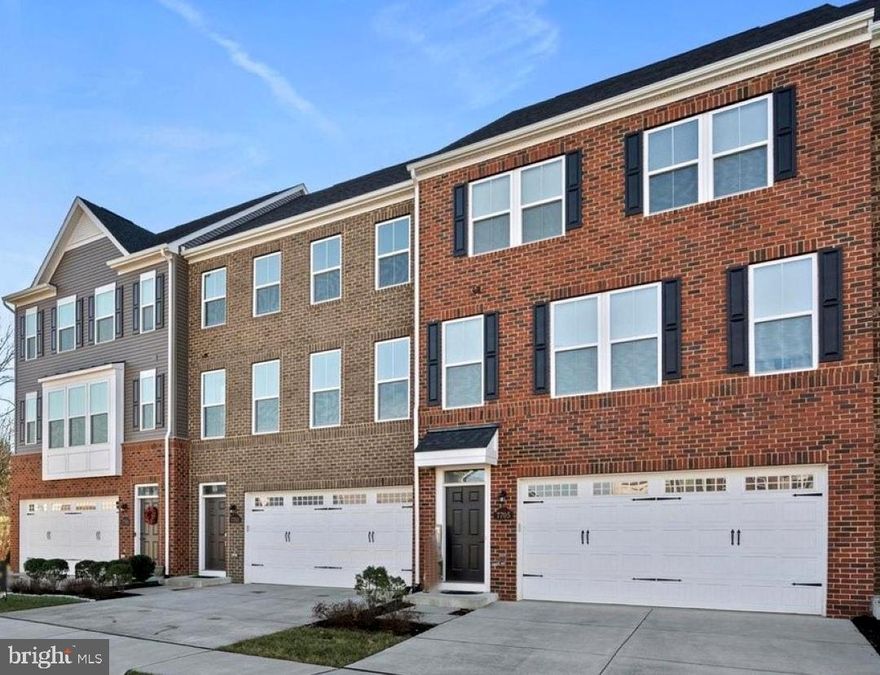 Don’t miss this breathtaking 4-bedroom, 3.5-bathroom townhome boasting over 3,100 square feet of luxurious living space. The gourmet kitchen features a spacious island, granite countertops, stainless steel appliances, and upgraded cabinetry. The dining area provides an inviting space for family meals. The main level offers convenience and comfort with a relaxing covered deck just off the kitchen. Upstairs, the primary suites  exudes elegance and sophistication with its luxurious upgrades, custom wall art, including an en-suite bathroom with a double vanity for extra storage, a roomy shower, and a separate toilet room for added privacy. The primary suite also features a walk-in closet. Additionally, the upper level features two more bedrooms, another full bathroom, and a laundry room. On the ground level, you’ll find a elegantly designed flexible living space that can serve as a fourth bedroom or an additional living/recreational area, complete with a full attached bathroom. Experience the perfect blend of style and functionality in this exceptional townhome!