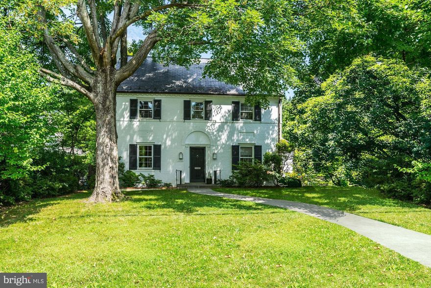 Picturesque perfection in this 5/6 Bedroom 4 1/2 Bath beautifully updated Colonial.  A gracious street presence welcomes you to 4 floors of expansive inviting rooms including a delightful Living Room with fireplace, handsome formal Dining Room, exceptional Family Room with custom built-ins and stunning gourmet Kitchen,all recently highlighted in Home & Design Magazine.  A wall of windows surrounds the Breakfast Room off Kitchen overlooking landscaped yard.  Upstairs the large Master Bedroom has cathedral ceiling, His/Her closets and gorgeous updated full Bath.  There are 3 additional Family Bedrooms and 2 full Baths. A finished 3rd Floor is amazing space with skylights for the Bedroom/Office/Playroom with built-ins and storage.  Lower Level has a  Bedroom/Office/Bonus Room and new full Bath, Laundry, Storage.   Outside there is a lush fenced yard, flagstone patio for family and entertaining.  Detached Garage.    Located just minutes from a pool club, several parks, Crescent Trail, the shopping, dining, Metro at Friendship Heights, Spring Valley and minutes to Bethesda, this is a dream come true for comfortable family living and warm entertaining.