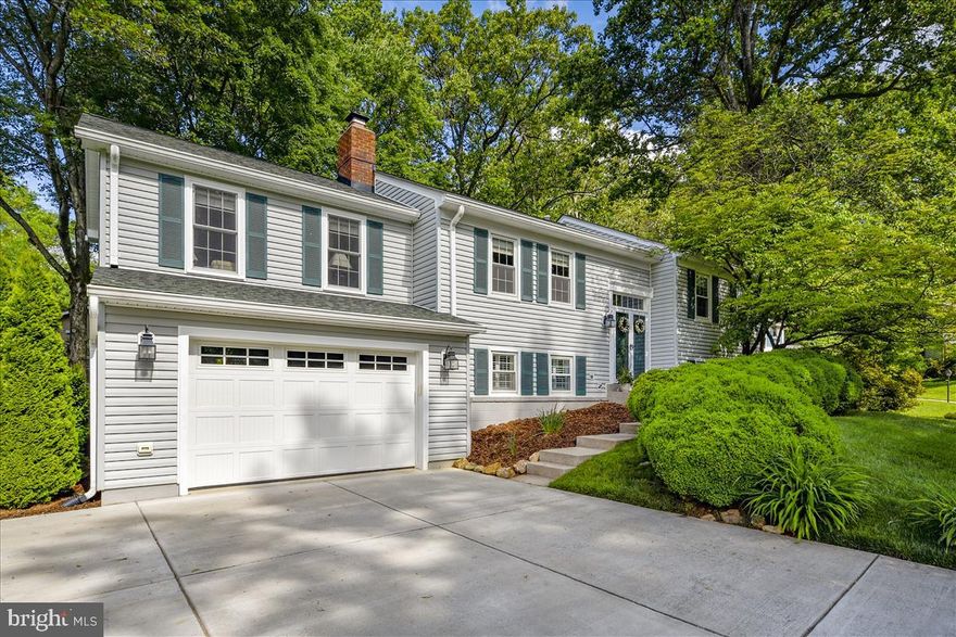 OFFERS WILL BE PRESENTED 5/20/19 * This home has over $100k in upgrades!  Open concept floorplan; fully renovated kitchen with Kraftmaid cabinets with soft close drawers; stainless steel appliances; granite counters; recessed lighting; hardwood floors throughout most of the home; fully renovated master bathroom with marble shower with pebble floor and glass doors; marble counters and tile floor; new carpet in the lower level bedrooms; enclosed 1.5 (or 2 small) car garage; added a huge (18x18) living room over the new garage; full laundry room with sink and cabinets; fully landscaped front and backyards; fully fenced backyard with extra large gate; deck and patio and so much more!