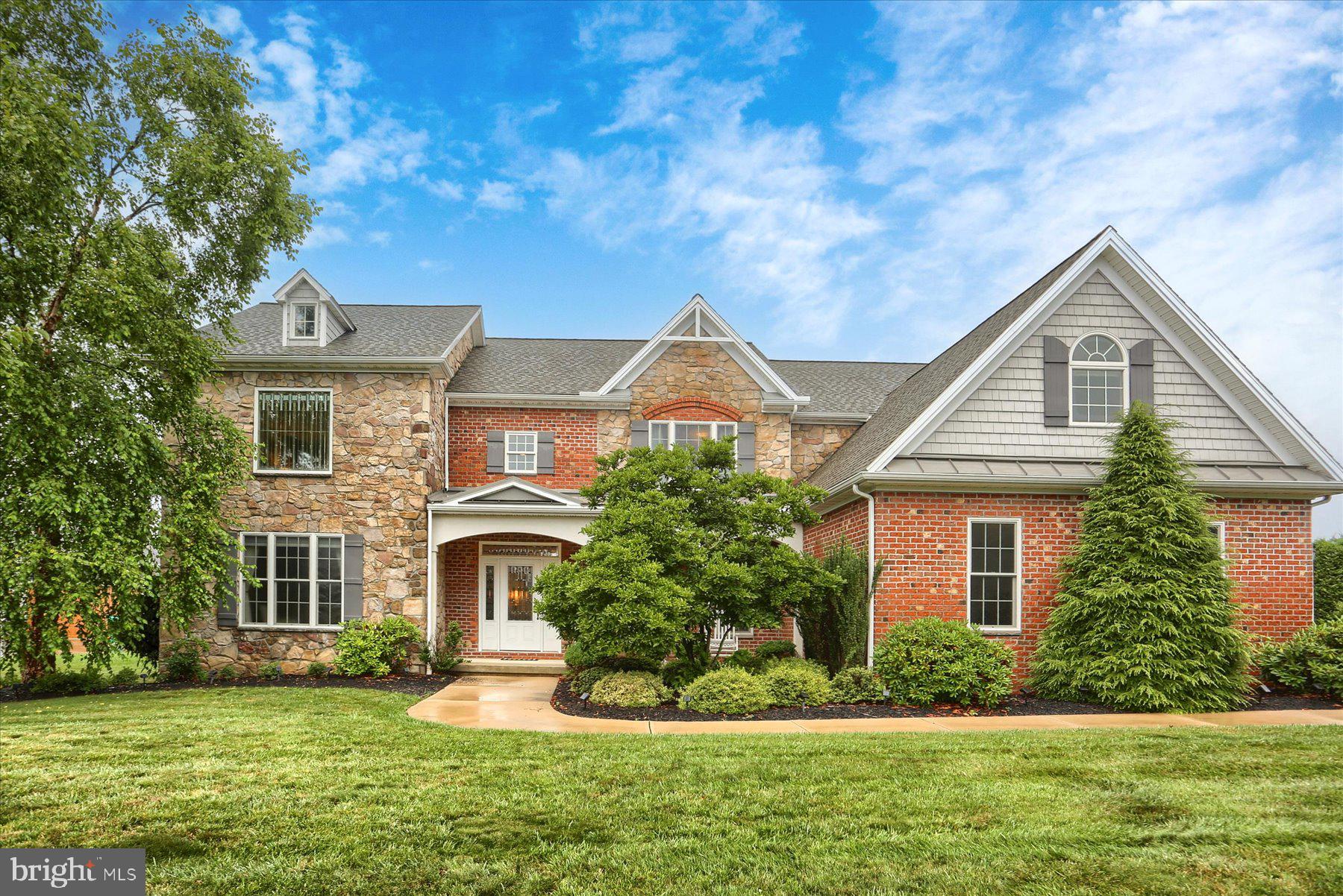 Experience luxury living at its finest in this stunning 5,010 sq ft, 4-bedroom, 5-bathroom home designed for both comfort and entertainment. Boasting an open floor plan, this home features a showstopping two-level den with a spiral staircase, perfect for relaxing or hosting in style. The heart of the home includes a modern wet bar with a built-in tap system, seamlessly connecting to an extra-large in-ground pool and expansive patio — your ultimate outdoor oasis. Whether you’re enjoying poolside cocktails or stepping in from a swim to grab a drink, this home makes entertaining effortless. Each bedroom includes its own private bath, while an additional full bathroom with direct outdoor access keeps your guests comfortable. Warm up by the cozy fireplace, store your vehicles in the spacious 3-car garage, and unwind in total seclusion thanks to the privacy fence surrounding the pool and patio areas. This property checks every box — space, style, and a truly unique layout. Welcome home!