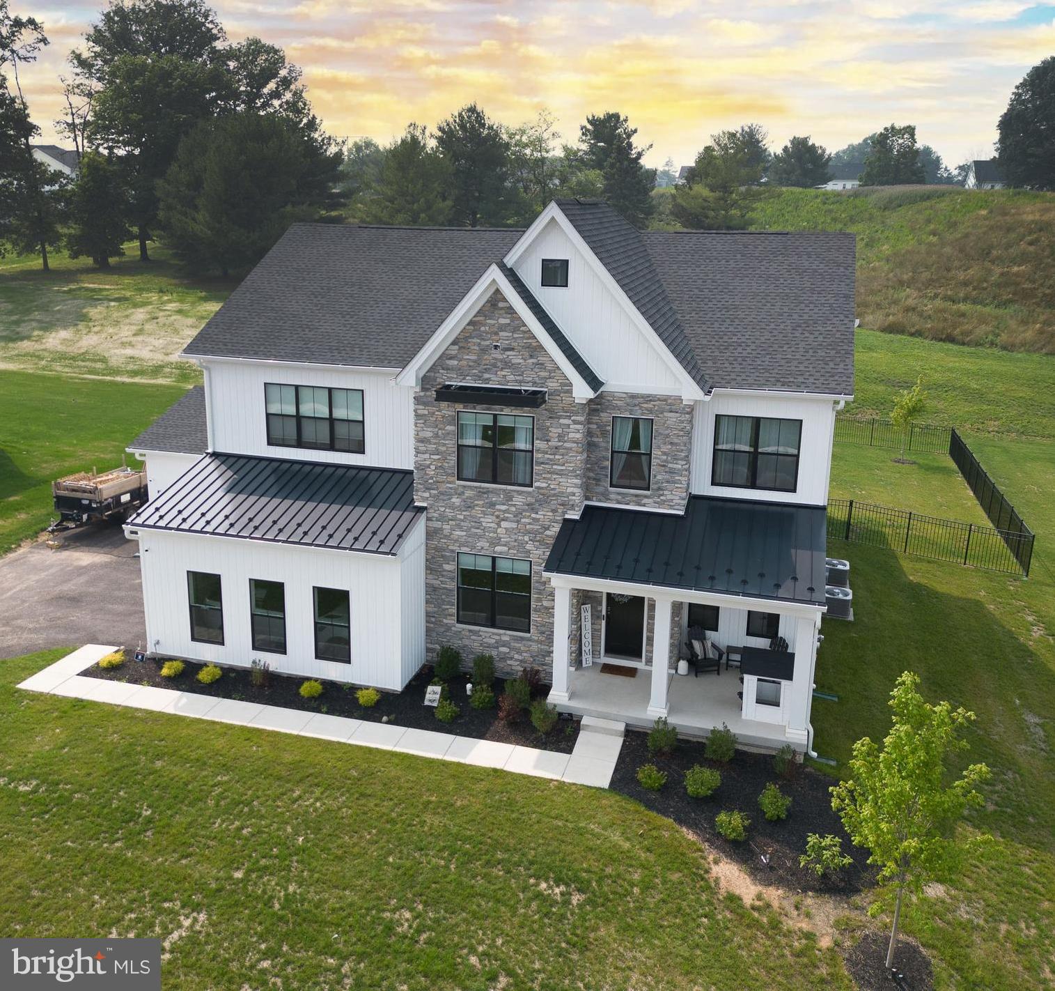 If HOME is your favorite four-letter word, then have I got one for you! This home is a showcase among many spectacular estate homes in the sought after Toll Brother's Reserve at Center Square Community, but this one is available NOW, today, that's right! You don't need to wait for a November delivery, you can move into this beautiful, turn-key, LUXURY personified, Rowling Modern Farmhouse. This thoughtfully designed home offers 3800 SQ FT with 5 well-appointed Bedrooms--including an en-suite on the Main Level which is perfect for an au-pair, your outlaws or when you have out-of-town guests for the weekend. You'll be impressed with the high level of upgrades throughout the home, but the Great Room featuring a gas fireplace and Chef's Kitchen is where you might say your next four-letter word: L O V E! Yep, you're going to fall in love with this tastefully curated home featuring an enormous center island topped with exquisite quartz and enough seating for all your friends as they observe your kitchen prowess working the impressive range highlighted with a pot-filler to help expedite feeding all those hungry guests. Working from home isn't an option, it's a must, so you'll enjoy the extra quiet space to work in the Main Floor STUDY or 2nd Floor Loft; either way, options are nice. Formal Dining Room offers a taste of TRADITIONAL to this Modern Farmhouse and a spot to display your furniture, but the Open Floor Plan with a modern twist makes this design hard to beat. Three car garage, fenced in rear yard and numerous upgrades displayed during your tour will affirm all the reasons WHY you'll want to call this gently used home YOURS! Quick access to the super charming town of Skippack with a myriad of shops and restaurants, and only minutes from Blue Bell offering numerous shopping and dining options too. Don't wait to call this home YOURS...Schedule your showing TODAY!