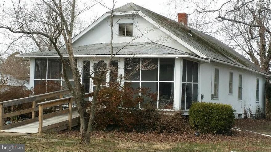 RARE opportunity - reduced price!!  Home or business? The choice is yours with this charming 1925 Sears catalog home waiting to be lovingly restored or converted to the business of your dreams!  A stone's throw from the front gate of NSWC Dahlgren! 1 acre with fruit and nut trees. Zoned commercial, grandfathered residential. Owned and loved by one family for 88 years. Sold as-is, priced to sell!