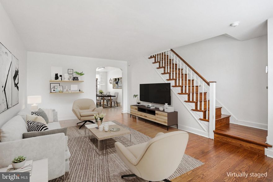 Enter into this stylishly refreshed rowhome in Overbrook Park and feel right at home. A welcoming front patio leads into a sun-filled living room highlighted by timeless hardwood flooring. The adjoining dining area flows effortlessly into the updated kitchen, creating an inviting open layout perfect for everyday living and entertaining. In the kitchen, you’ll find sleek white tile floors, granite countertops, a tiled backsplash, ample white cabinetry, and newer stainless steel appliances—including a never-used dishwasher that has already been installed. Open shelving and a breakfast bar enhance both function and style. Upstairs, three comfortable bedrooms all feature hardwood floors, along with an updated full bathroom complete with tiled walls, a modern vanity, a newer toilet, and a glass-enclosed tub and shower combination. The finished basement adds valuable living space and versatility, ideal for a media room, office, gym, guest area, or potential fourth bedroom. It also includes a full bathroom with a glass-enclosed shower and durable LifeProof luxury vinyl plank flooring. Recent improvements provide added value and peace of mind, including a roof repair in 2025, refreshed stair treads leading to the basement, and fresh paint throughout the home. The garage interior has been newly painted and features a brand-new door. Key systems have been well maintained, with both the HVAC system and water heater are newer, along with a newly installed chimney liner for the heater.  This home is ideally situated near Rose Playground, public transportation at 69th Street Terminal, shopping, and City Avenue, with convenient access to Center City and University City. Mortgage savings may be available for buyers of this listing.
