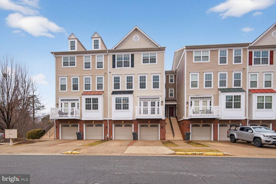 This beautiful townhome style condo is move-in ready and you'll find gorgeous hardwood floors on ALL LEVELS and FRESH NEUTRAL PAINT throughout!  The kitchen offers plentiful cabinetry, pantry, recessed lights, granite counters and stainless steel appliances including a gas stove, built-in microwave, dishwasher and refrigerator with ice maker.  The living room offers a ceiling fan with light with a French door to the private balcony that has been recently powerwashed.  The spacious primary bedroom suite features wood floors, a tray ceiling with crown molding, a ceiling fan with light, a huge walk-in closet and luxurious primary bathroom with ceramic tile floor, dual-sink vanity, large soaking tub and separate shower.  The second and third bedrooms share the 2nd full bathroom.  Full size washer and dryer are located on the bedroom level.  There is parking for two in the one-car garage and driveway along with plentiful guest parking.  Hurry to see this one before it's gone!