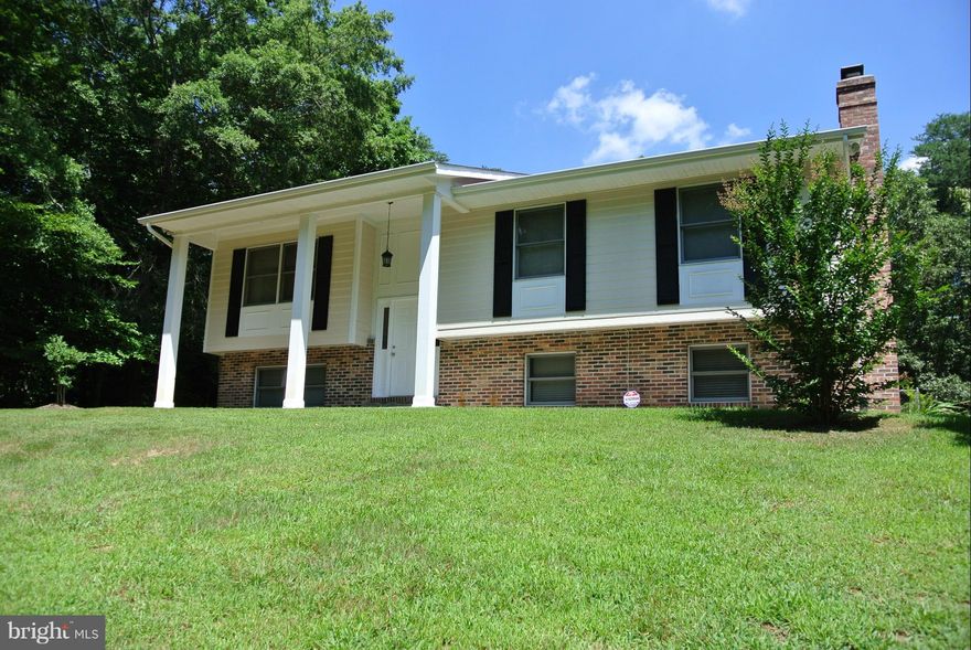 Spacious Well Maintained  Home on over 3 Level Acres.  Fenced Back Yard.  Updates Throughout.  Great Commuting Location. No HOA.  Bedroom in Basement perfect for an In-Law Suite. Huge Deck overlooking back yard.  End of a Cul-De-Sac. Enjoy county living at its finest.