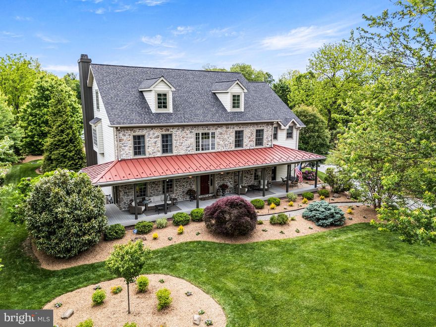 Welcome to 1548 Morstein Rd. Beautifully custom and truly one
of a kind, this exceptional residence is designed for those who
value character, space, and thoughtful design details —far from
cookie-cutter in both layout and lifestyle. With over 6,000 square
feet across three floors, the home features hardwood floors,
generous room sizes, high ceilings, and large windows.
The main level offers an effortless blend of elegance and comfort.
A bright and cheerful great room features a wood burning
fireplace and abundant light from the oversized windows. The
kitchen is truly the heart of the home, thoughtfully planned and
beautifully appointed with granite countertops, travertine
backsplash, a Wolf 4-burner cooktop with 24in s/s griddle, pot
filler, double ovens, built in refrigerator & freezer, center island
and wrap around countertop with seating for 6. There is also a
cheerful morning/sunroom adjacent to the kitchen & overlooking
the grounds and patio at the back of the house. A “friends
entrance” from the breezeway/driveway boasts an expansive
mudroom and entry with slate flooring and coat closet adding to
everyday convenience. Off the mudroom is a generous home
office area which can also be converted to a first floor guest suite
if desired. The home is thoughtfully designed so that an elevator
could easily be installed in the future. The 2nd floor of the house
features a stunning primary suite with a luxurious primary bath
with french doors to a private balcony and walk in shower. The
primary suite includes 2 walk-in closets and a spacious dressing
area. Additional bedrooms include one with an en-suite Bath and
walk in closet, and two more with walk in closets and a well-
appointed Hall Bath with jacuzzi tub and separate water closet.
The laundry room is conveniently located on this level attached to
the built-in desk area, with stair access to a newly finished third
floor. This level offers a large bonus room and full bath —ideal for
a music studio, art studio, game room or future additional
bedroom(s).
Outdoor entertaining is exceptional featuring lush landscaping
and a fabulous front porch perfect for lazy summer days and
relaxing. The back of the house provides outdoor living at its
finest with a fenced backyard, expansive hardscape patio, firepit
area and room to play and relax!
Car enthusiasts will appreciate five garage bays: three attached
and two in a detached garage. The over-sized attached garage
offers a work area, dedicated electric car charging port and a
walk-up loft space ready to be customized. Ideally located in the
award-winning Great Valley School District, just minutes to
downtown Malvern & downtown West Chester, and close to
everywhere you want to be - offering easy access to the PA
Turnpike, train station, shopping, restaurants and parks.