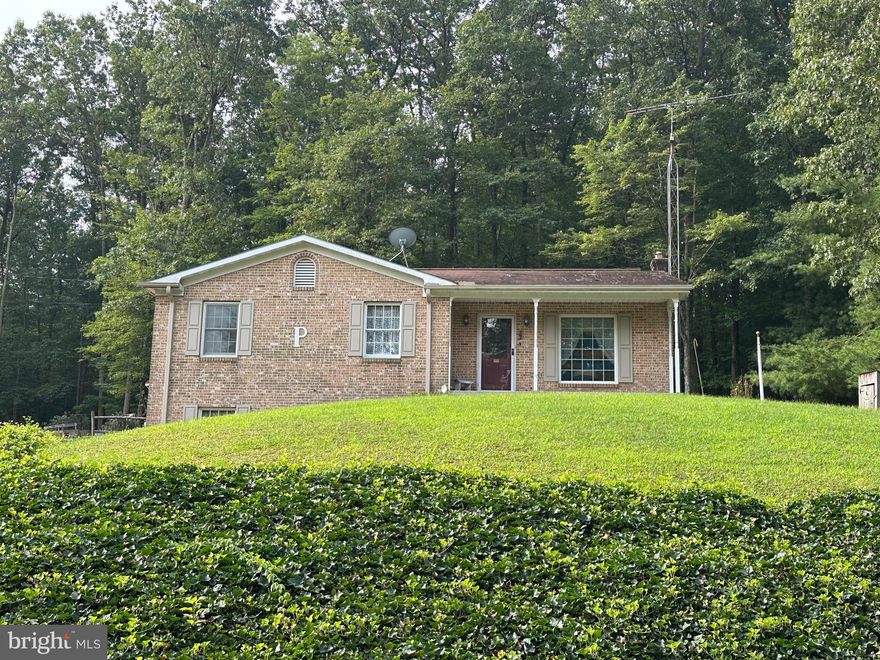 Welcome to 7714 Fern Grotto Circle, a peaceful retreat nestled near the end of a wooded cul‑de‑sac in Fayetteville. This single-family home, built in 1987, sits on a generous 0.46‑acre parcel offering both seclusion and convenience.

Enjoy nearly 1,839 total finished  sq ft of living space, featuring a comfortable living area, kitchen, 2 bedrooms, 1 1/2 bathrooms, large sunroom and a finished basement. The attached 2 car garage, front porch, water fall/pond and all brick exterior add to the home's practicality and charm. ***New Roof August 2025***

Ideal for those seeking a quiet, nature‑embraced setting while remaining within easy reach of Fayetteville and Chambersburg amenities. Local schools are nearby, with elementary just over 2 miles away and secondary schools within 8 miles.

Whether you're looking for your next home or a rental opportunity, this property delivers value and potential in a tranquil setting.

Call today to get your showing scheduled!!