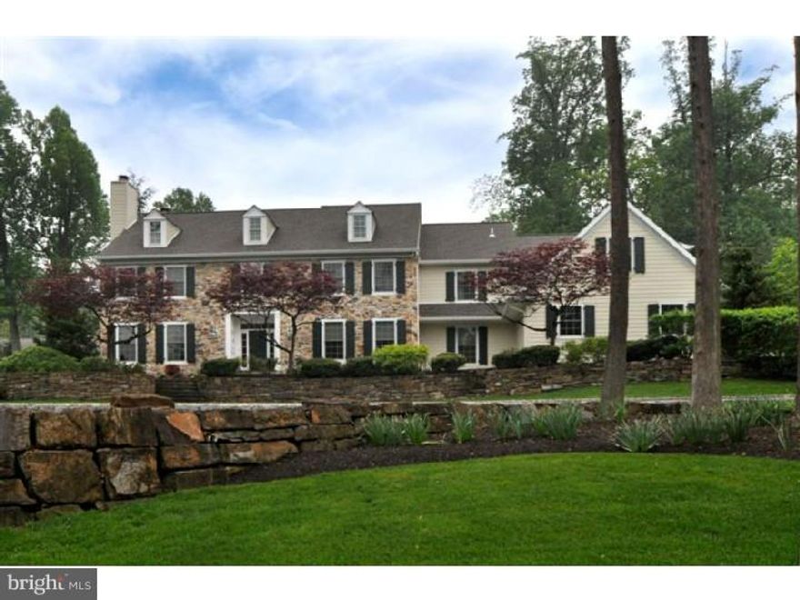 Beauty, warmth & comfort are the hallmarks of this traditional, shutter trimmed colonial which is tucked away on a quiet cul-de-sac street in the award winning School District of Lower Moreland.  Situated on beautiful grounds in a neighborhood of picturesque homes, it is the essence of quiet elegance and lends itself to either stylish or casual entertaining.   As you enter, a 2 story foyer with turned staircase greets you & welcomes you to the comfortable Living Room with wood burning fireplace & French doors which open to a cozy den/office with a full wall of bookcases.  Feast in uncrowded comfort in the spacious Dining Room or relax in the Great Room with its soaring ceiling, & wood burning fireplace.  Impromptu meals can be eaten on the kitchen island, complete with built-in microwave & gas cook top, or use the island as additional space for buffet service. From the spacious breakfast room, French doors lookout on to a flagstone patio for summer dining, relaxing or entertaining.  There is endless storage space for seldom used as well as everyday cookware & dishes. Sumptuous comfort & coziness characterize the Main Bedroom where there is room for your king size furniture ++++.  Separate sinks, ample counter-tops, a shower, a Jacuzzi tub & His & Her dressing areas are the highlights of the Main Bath.   Four spacious bedrooms & 2 other Bathrooms complete this level. The sizable full basement will relieve your storage problems & also provide ample space for family hobbies. Secluded patios surrounded by manicured lawns, flowering shrubs & trees, provide peaceful relaxation & comfort. This is a home that has been seasoned with love & shown with pride.  One look & you won't want to leave.