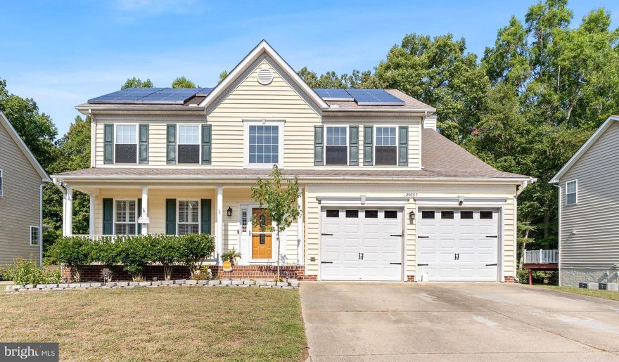 ** Price Reduction [ Motivated Seller ** Come and look at this spacious 5-bedroom, 3.5-bathroom residence that's ideally located near the base, ensuring an easy commute to work. The moment you step inside, you'll be captivated by the thoughtful design and attention to detail. The inviting front porch is perfect for sitting and relaxing after a long day. The living room can easily serve as a home office or additional living space, and the formal dining room is perfect for hosting dinners and special gatherings. The kitchen features newer stainless steel appliances (2016 & 2018), granite countertops, a large center island with seating, a touchless sink faucet, and a stylish backsplash. Enjoy the convenience of a spacious pantry and battery-operated blinds in the large picture window. The expansive family room, with its cozy wood-burning fireplace, is ideal for chilly evenings, and the sunroom room offers additional space for relaxation, reading, plants or entertaining. Elegant finishes like crown molding, chair rail, and white shutters throughout the home add a sophisticated touch.

Upstairs, you'll find four generous bedrooms, including a luxurious master suite with a huge walk-in closet, a second closet, and a master bathroom that was recently painted and features a newly installed bathtub, a separate shower, and a separate water closet. The convenient laundry room is also located on this level. The lower level features a versatile great room or bonus area that could be used as a game room, home schooling space, theatre room or additional living area, along with the fifth bedroom and a full bathroom, making it ideal for guests or extended family. A large storage room provides ample space for all your extra items. Recent updates include new carpet in three upstairs bedrooms, freshly shampooed carpets on the main level and basement, a power-washed exterior, and a recently serviced HVAC system. The property also boasts energy-efficient solar panels which significantly reduce electric costs. Off the sunroom you will find maintenance-free Trex decking and vinyl railing, and a fully fenced rear yard that backs to trees. Enjoy beautiful landscaping, a small patio with entrance to the basement that is perfect for grilling and entertaining, and a lawn sprinkler system to keep your grass green during the summer. Hot water tank was replaced in 2020 alongside the HVAC and furnace. Welcome home to a property that combines comfort, convenience, and style—schedule your tour today and discover everything this exceptional home has to offer!