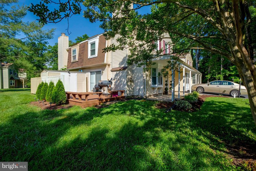 Come view this beautiful quadraplex townhouse. Tastefully decorated, this townhouse was renovated 3 years ago, so everything is practically new!  Gorgeous laminate wood floors throughout the main level, which features living room with a fireplace, and a second living room, kitchen with stainless steel appliances, modern ceramic tiled bathrooms.  Won't last long! 2 yr old roof!