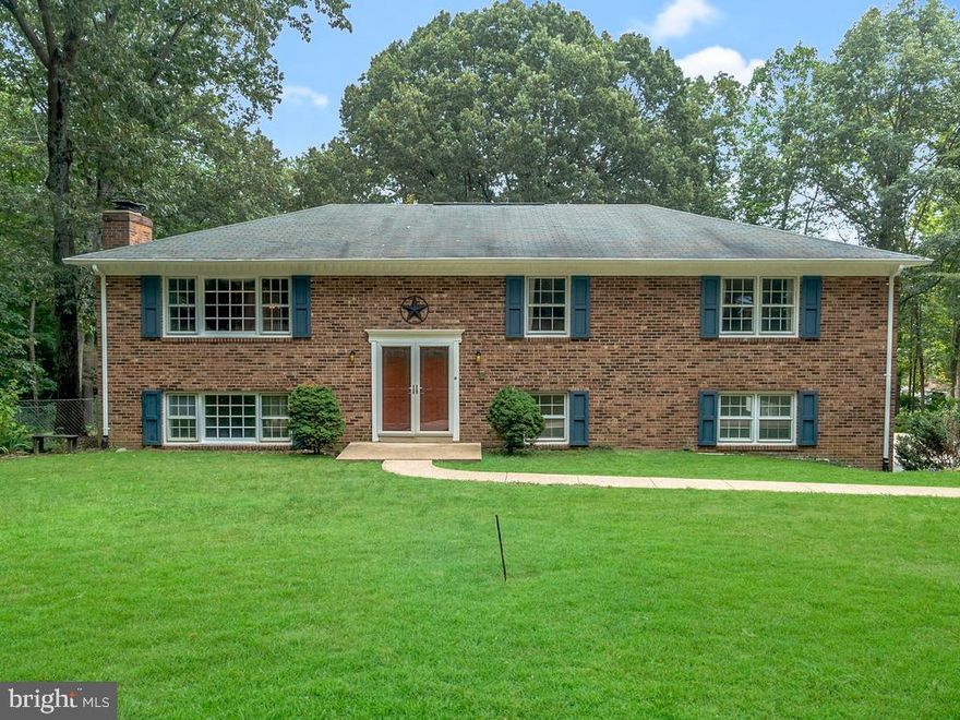 Check out this amazing home located close to Quantico.  New carpet throughout, new main bath renovated, updated kitchen and primary bath just a few years ago.  This home sits on one acre and NO HOA.  Home is a split foyer with 4 bedrooms, 3 full bathrooms and 2 fireplaces.  Enjoy a newly painted deck and a partially fenced in backyard.  Make your appointment today before this home is gone!