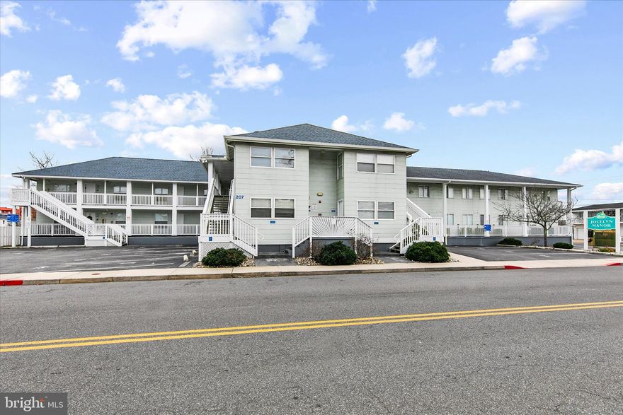 Welcome to Jocelyn Manor, your downtown Ocean City oasis just moments from it all. Ideally located only a couple of blocks from the white sandy beaches and the iconic Ocean City Boardwalk, this 3 Bedroom, 2 Bath condo also sits close to the bay at the opposite end of the street. Restaurants, bars, shops, and endless entertainment surround you, placing you right in the heart of this vibrant coastal destination.

This inviting first-floor condo offers three bedrooms and two baths and comfortably sleeps up to eleven guests, making it ideal for personal use, rental income, or a combination of both. The open floor plan is bright and functional, featuring ceramic tile flooring throughout the main living areas, stainless steel appliances, and a kitchen equipped with a dishwasher and refrigerator with ice maker. An in-unit washer and dryer add everyday convenience. The condo is being sold partially furnished and has a solid rental history with excellent potential for increased income in future seasons.

Located on the back side of the building, the unit provides easy access to the community pool and sun deck, just steps from your door. It’s the perfect place to relax when beach conditions aren’t ideal or to unwind after a day in the sun. On-site parking adds to the convenience, and bay-side activities are only a few blocks away, including a public fishing and crabbing pier and a newly renovated waterfront park.

With a little personal customization, this condo could be your ideal beach retreat or a standout investment property. The condo fee includes basic cable TV, hot water, water and sewer, master hazard insurance, flood insurance, and all common area maintenance, allowing for easy, low-maintenance coastal living.

Whether you’re looking for a beach getaway, an income-producing property, or both, Jocelyn Manor offers an unbeatable location and a relaxed Ocean City lifestyle.