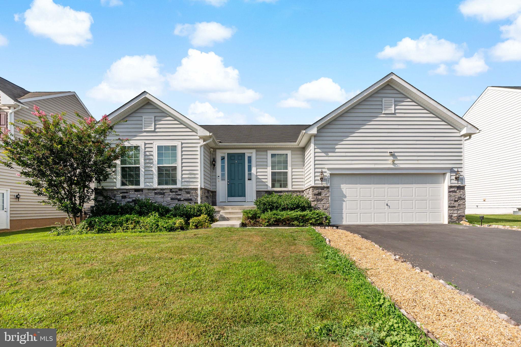 Checkout this well-maintained rancher with a finished basement! Located in the Shenandoah Springs Community of Ranson, this home features over 3,400 square feet of living space, LVP flooring, granite countertops, custom blinds, and a fenced in back yard with a beautifully crafted stone patio. The main level has everything you need with a mud room, laundry room, and 3 beds and 2 full baths, including the primary suite. The open concept between the kitchen, dining, and living areas offers plenty of space to entertain and enjoy every moment. The oversized basement comes complete with a large 4th bedroom, a 3rd full bath, and a great rec room setup that is perfect for game days or movie nights. Just off Route 9 and near 340, this location is great for commutes and is close to local shops and restaurants.