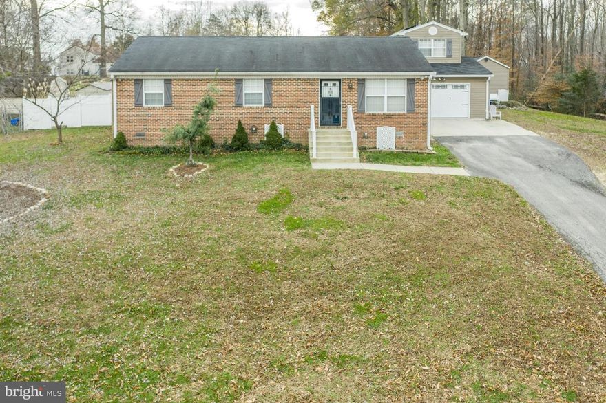 Make us an offer we can't refuse! PRIVATE HOME away from others but in a neighborhood, walk DOWN TO WOODED STREAM beside your new home.  Hard to compare last home on the street with privacy.  Too many amenities to list.  Take a look at the VIRTUAL TOUR.  4 BD/2.5 BA/2car attached garage. Large front living rm, HUGE Family rm with wood stove/ L-shaped ranch 1,900+ sq ft.  Best of all NO HOA!!!  Features smart home accessibility, newer stainless steel appliances, new siding, new insulation, SOLAR PANELS which provide monthly savings, Large Amish Shed for projects and another smaller shed.  Come entertain on the covered outdoor patio.  Potential for additional rental income from separate bedroom over garage.  Close to shopping, short commute to DC and Andrews AFB.