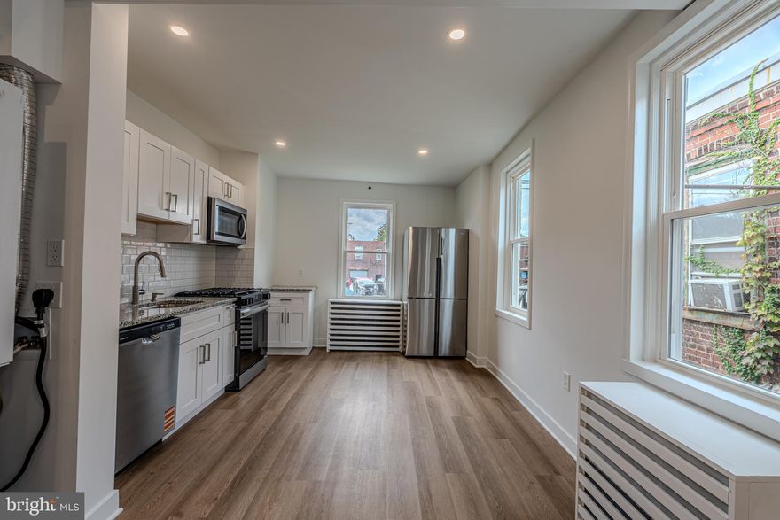 Fully updated and income-producing 2+2 duplex with strong, in-place rental income. This turnkey property features full renovations throughout both units, including updated kitchens, refreshed bathrooms, modern flooring, brand new windows throughout, and improved mechanicals for extremely low-maintenance ownership. The first-floor unit is currently rented at $1,400/month, and the second-floor unit is rented at $1,350/month, offering immediate and reliable cash flow. Both tenants are stable and wish to remain. Ideal for any investor seeking a fully renovated, stabilized asset with all major updates complete. Convenient location close to transportation, shopping, and local amenities. A great addition to any portfolio.