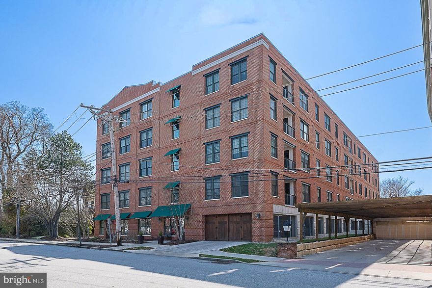 Welcome to refined Main Line living in this exceptional, rarely available, 2-bedroom, 2-bath residence at Cambridge Square, an intimate boutique community in the heart of Ardmore. This turnkey home has been thoughtfully updated with high-end finishes and modern enhancements throughout.

The light-filled, open-concept layout features oversized new windows, 9-foot ceilings, fresh paint, and recessed LED lighting. The gourmet kitchen is appointed with granite countertops, stainless steel appliances, abundant cabinetry, and a spacious island that flows seamlessly into the dining and living areas—ideal for everyday living and entertaining. Step out to the private balcony, perfect for morning coffee or evening relaxation.

A flexible den with French doors offers the ideal space for a home office, fitness area, or potential third bedroom. A dedicated laundry room with newer front-loading washer and dryer adds convenience.

The primary suite features hardwood flooring, two closets (including a walk-in), and a spa-inspired en-suite bath with double vanities, a jetted soaking tub, and a glass-enclosed shower. The second bedroom also offers hardwood flooring, two closets (including a walk-in), and access to a full bath.

Exceptional storage throughout includes generous closet space in both bedrooms, abundant kitchen cabinetry, and a private storage unit located within the building.

Additional highlights include two deeded garage parking spaces. Cambridge Square offers secure entry, elevator access, a fitness room, and a beautifully maintained community patio with grill.

Unbeatable location: approximately a 10-minute walk to the train with service to Main Line towns, Center City Philadelphia, and New York City. Just 2 minutes to Trader Joe’s, Ardmore Farmers Market, and local conveniences, and a 5-minute walk to Suburban Square’s premier shopping and dining, including Apple Store, Lululemon, Urban Outfitters, PopUp Bagels, Starbucks, and Van Leeuwen Ice Cream. Nearby fitness options include Life Time Fitness, Barry’s, and SoulCycle.

Located in the top rated Lower Merion School District and less than a 10 minute walk to Lower Merion High School. A rare opportunity for luxury, low-maintenance living in one of Ardmore’s most desirable communities.
