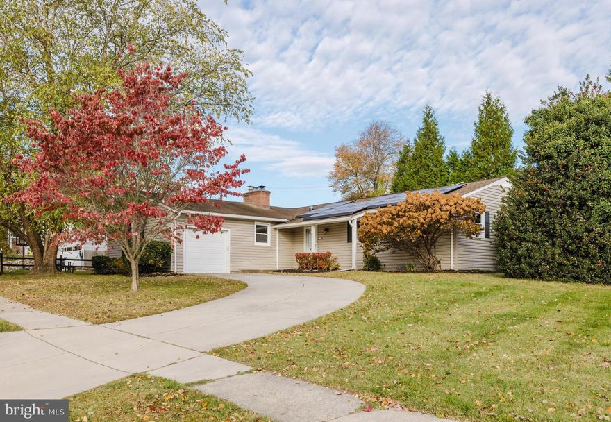 Beautifully renovated 3-bedroom, 2-bath rancher offers bright one level living. The kitchen and dining room were fully renovated in 2022, featuring recessed lighting and stainless steel appliances, and tasteful backsplash. Gas fireplaces in both the family room and living room. Adjacent to the living room, a sunroom with skylights adds natural light and extra living space. This charming home features a main level laundry, fully fenced yard, hardwood floors, and custom built-ins. The master bathroom received a complete modern renovation in 2022. Additional updates include upgraded sliding doors and windows. Updated architectural shingle roof with owned solar panel connected to the grid, allowing for an average utility bill of $253.00 a month.