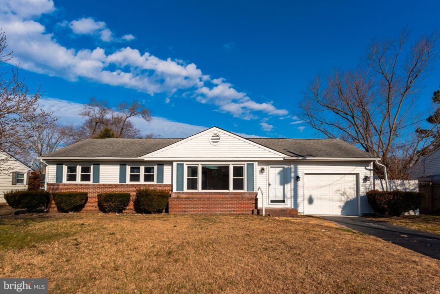 This inviting single-level home features beautiful hardwood floors throughout and a stylish kitchen complete with butcher block countertops. Enjoy outdoor living in the  fenced rear yard—perfect for pets, play, or entertaining. The attached garage includes a mini-split system, providing year-round comfort and flexibility for work or hobbies. Conveniently located close to schools, shopping, and commuter routes, this home offers comfort, character, and convenience all in one! Plus, no City taxes.