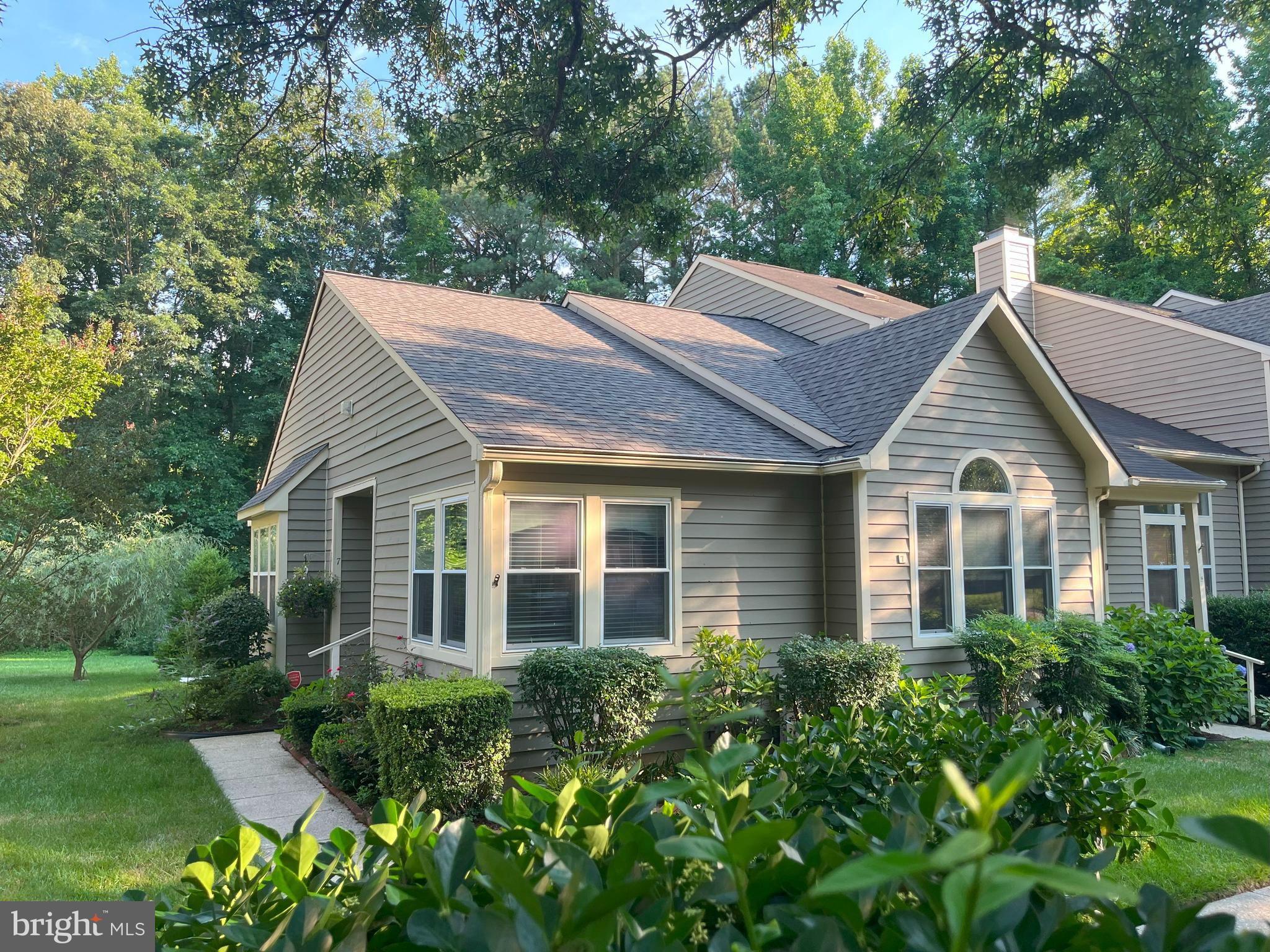 Coming soon. Popular Hunt Meadow townhome model ONE-LEVEL living-2 BDRM/2 BA - with basement! Wood floors throughout- tile in kitchen, vaulted ceilings, gas fireplace. Remodeled main Bathroom. Recent new roof and deck. Reasonable HOA fees of $250/mo. covers pool/tennis/jog-bike trails, prof off-site mgmt.; lawn maintenance; trash; snow shoveling to your front door! Pictures and docs to be uploaded soon.