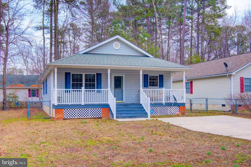 Welcome to 2005 McKinney Blvd in Colonial Beach, Virginia. Built in 2004 and lovingly maintained by the original owners, this home has only ever been used as a weekend getaway — a true testament to its light use and excellent condition. 

Offering 3 bedrooms and 2 full bathrooms, the home features a simple, functional layout designed for comfortable living. Step onto the inviting front porch and into the main living area, where vaulted ceilings create an open, airy atmosphere that flows seamlessly into the kitchen. The kitchen includes a new refrigerator and provides a welcoming space that’s perfect for cooking or quiet mornings with coffee.

As you move down the hallway, you’ll pass two bedrooms and a full bathroom before arriving at the spacious primary suite, complete with its own private full bathroom and plenty of room to unwind.

Conveniently located near groceries, local schools, restaurants, and the Potomac River, this property offers both comfort and accessibility — whether you’re searching for a full-time residence or the ideal weekend retreat.