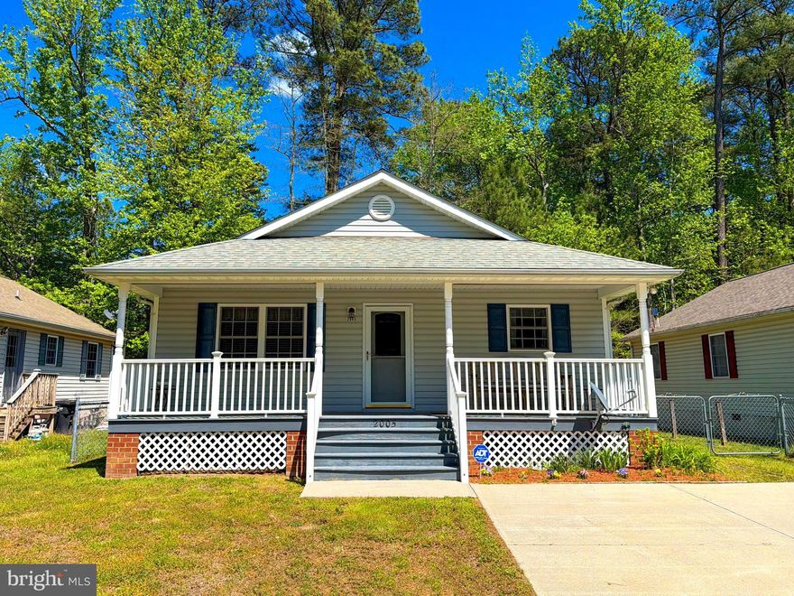 Welcome to 2005 McKinney Blvd in Colonial Beach, Virginia. Built in 2004 and lovingly maintained by the original owners, this home has only ever been used as a weekend getaway — a true testament to its light use and excellent condition. 

Offering 3 bedrooms and 2 full bathrooms, the home features a simple, functional layout designed for comfortable living. Step onto the inviting front porch and into the main living area, where vaulted ceilings create an open, airy atmosphere that flows seamlessly into the kitchen. The kitchen includes a new refrigerator and provides a welcoming space that’s perfect for cooking or quiet mornings with coffee.

As you move down the hallway, you’ll pass two bedrooms and a full bathroom before arriving at the spacious primary suite, complete with its own private full bathroom and plenty of room to unwind.

Conveniently located near groceries, local schools, restaurants, and the Potomac River, this property offers both comfort and accessibility — whether you’re searching for a full-time residence or the ideal weekend retreat.