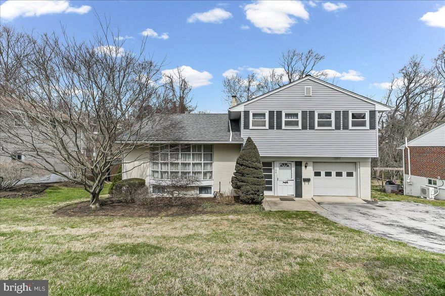 Welcome to 106 Lindbergh Avenue in Broomall, a classic split-level home in a great neighborhood, offering space, flexibility, and the opportunity to make it your own. As you enter, you’re welcomed on the foyer level, which includes a convenient powder room, access to the attached one-car garage, a bedroom which could also serve as an office, and sliders leading directly out to the backyard, creating an easy connection to outdoor living. The lower level features a walk-out finished basement with access to a patio, offering the perfect space for a family room, playroom, or additional living area. This floor also has a large storage room with laundry. Up on the main level, you’ll find a large living room with floor to ceiling windows, formal dining room, and an eat-in kitchen with pantry, providing plenty of room for both everyday living and entertaining. The upper level offers three bedrooms, all with ample closet space and ceiling fans. A full hall bath with tub serves the secondary bedrooms, while the primary bedroom includes its own private bath with a stall shower. Set on a private lot backing to the woods, the backyard offers a peaceful setting with space to relax, entertain, or enjoy nature. A storage shed attached to the home adds additional convenience. This home offers a great opportunity to add your own personal touches while enjoying a solid layout and a fantastic location plus the roof is only a couple years old