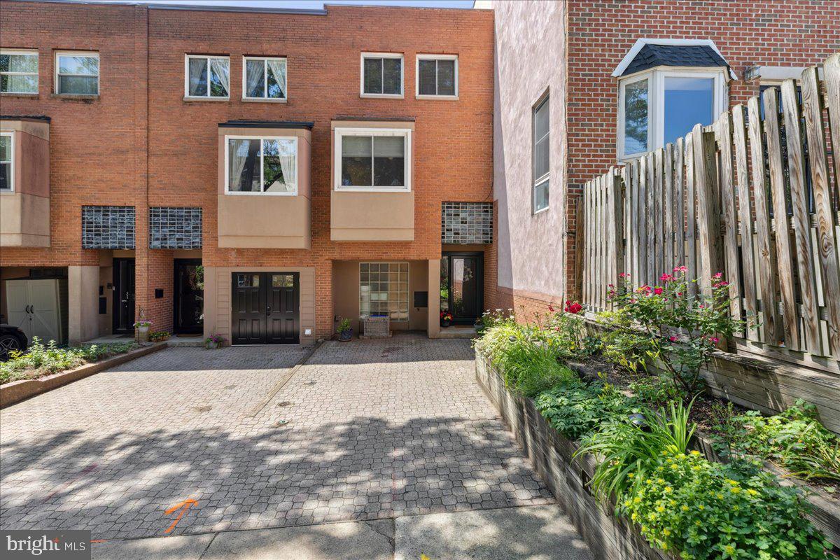 Tucked away in a serene private courtyard in the heart of the sought-after Art Museum area of Philadelphia, this beautifully updated three-story townhome offers a rare combination of quiet seclusion, unbeatable walkability & private parking! Located just steps from the iconic Philadelphia Museum of Art, Kelly Drive, Fairmount Park, and an array of cafes, shops, and restaurants, this home is perfect for anyone seeking a vibrant city lifestyle with a peaceful place to call home.
As you step inside, you’ll immediately notice the warmth of the rich hardwood floors that flow throughout all three levels. The main floor features a thoughtfully remodeled kitchen with modern cabinetry, upgraded countertops, stainless steel appliances, and stylish tilework—ideal for both everyday living and entertaining guests. Natural light pours in through newer windows, creating a bright and inviting space throughout the home.
Upstairs offers flexible sleeping arrangements, including a fully renovated primary suite with a bathroom that has been completely remodeled with sleek finishes, updated fixtures, and Italian tile accents, adding a touch of luxury to your daily routine. Outside is your own private backyard- a perfect spot for enjoying a morning coffee, hosting a small gathering, or gardening. This property is nestled within a quiet courtyard which offers an added layer of privacy and calm rarely found in such a central location. Major improvements have already been completed for added peace of mind, including a newer roof, brand-new water heater, and a newer HVAC system.The new windows preserve the home's charm while incorporating modern conveniences.This is a true gem in one of Philadelphia’s most cherished neighborhoods—don’t miss your chance to call it home!