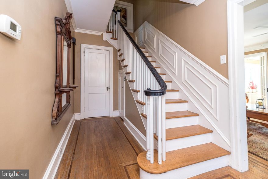 As the address implies, this home is situated in the well-known Rosedale retreat of Pottstown Borough, Montgomery County, PA. A side walk-lined street guides the visitor to an in-bloom pink Magnolia tree and flagstone walk leading to this home with a grand porch-covered and railed entry with lead glass sidelights. Inside, a sweeping staircase and inlaid wooden floors capture your attention. To one side is the living room and adjoining sunroom providing ample daylight. The living room has a genuine wood-burning fireplace bordered by Mercer tiles (Moravian Pottery & Tile Works) and 2 sets of French doors that lead to the sunroom. To the other side is a formal dining room. As you will see, crown molding and high baseboard adorn most rooms and a powder room is nestled to the side of the staircase. From the dining room easily enter the tiled kitchen w/ granite counter and stainless appliances. The kitchen leads to a breakfast nook, mudroom and basement. From mudroom, a sliding door provides access to a flagstone patio w/ half wall. From the sliding door, it’s an easy walk to your garage also. Back at the staircase, a turned set of stairs leads to a master bedroom and accompanying tiled master bathroom, tiled hall bathroom, two good-sized bedrooms and a desirable 2nd floor laundry w/ glass door. A second set of turned stairs leads to two other bedrooms on a 3rd floor ! The bedrooms have dormer windows, some eave storage and there’s even a cedar closet. The bathroom is tiled and has a period-clawed bathtub. The basement offers interior, perimeter drain protection, another laundry hookup if desired, a oil-hot water heater and outside entrance. The house is fully air-conditioned and a new roof, siding and windows were installed in 2018. A multitude of retail stores, Pottstown Hospital, The Wyndcroft School, 2 DYI centers and easy access to Rt 422 surround this quaint house and neighborhood.