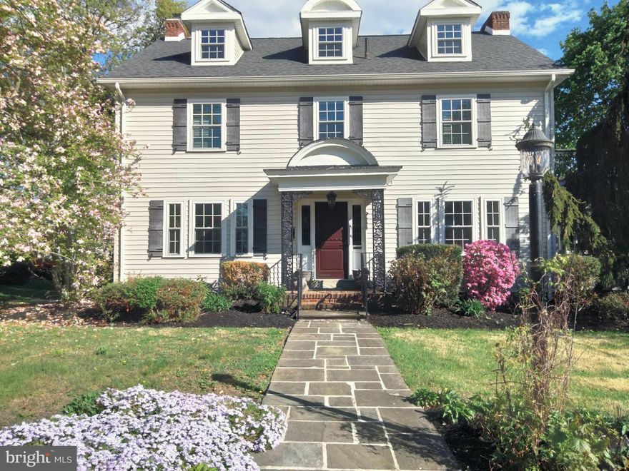 As the address implies, this home is situated in the well-known Rosedale retreat of Pottstown Borough, Montgomery County, PA. A side walk-lined street guides the visitor to an in-bloom pink Magnolia tree and flagstone walk leading to this home with a grand porch-covered and railed entry with lead glass sidelights. Inside, a sweeping staircase and inlaid wooden floors capture your attention. To one side is the living room and adjoining sunroom providing ample daylight. The living room has a genuine wood-burning fireplace bordered by Mercer tiles (Moravian Pottery & Tile Works) and 2 sets of French doors that lead to the sunroom. To the other side is a formal dining room. As you will see, crown molding and high baseboard adorn most rooms and a powder room is nestled to the side of the staircase. From the dining room easily enter the tiled kitchen w/ granite counter and stainless appliances. The kitchen leads to a breakfast nook, mudroom and basement. From mudroom, a sliding door provides access to a flagstone patio w/ half wall. From the sliding door, it’s an easy walk to your garage also. Back at the staircase, a turned set of stairs leads to a master bedroom and accompanying tiled master bathroom, tiled hall bathroom, two good-sized bedrooms and a desirable 2nd floor laundry w/ glass door. A second set of turned stairs leads to two other bedrooms on a 3rd floor ! The bedrooms have dormer windows, some eave storage and there’s even a cedar closet. The bathroom is tiled and has a period-clawed bathtub. The basement offers interior, perimeter drain protection, another laundry hookup if desired, a oil-hot water heater and outside entrance. The house is fully air-conditioned and a new roof, siding and windows were installed in 2018. A multitude of retail stores, Pottstown Hospital, The Wyndcroft School, 2 DYI centers and easy access to Rt 422 surround this quaint house and neighborhood.