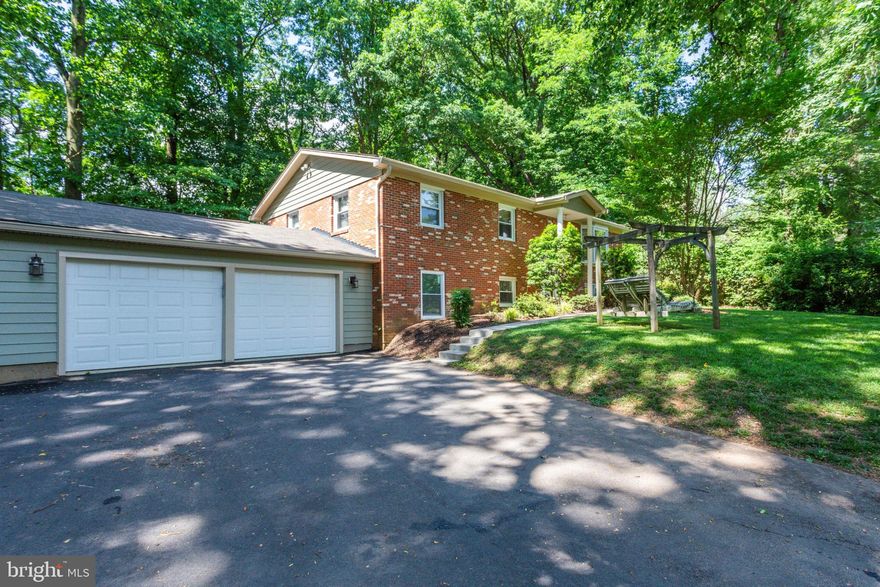 WALK TO THE METRO! 1.2 MILES FROM THE VIENNA STATION. 4 BEDROOM, 3 BATHROOM SINGLE FAMILY HOME WITH A LAUNDRY LIST OF UPDATES. ***CONVERTED THE OLD GARAGE INTO LIVEABLE SPACE***. THIS INCLUDES A LEGAL 4TH BEDROOM DOWNSTAIRS TO GO ALONG WITH A FULL BATH. HUGE STORAGE ROOM FOR YOUR EXTRA BELONGINGS, OFFICE AREA, MUDROOM WITH BUILT-IN SHELVES. ***NEW GIGANTIC 2 CAR GARAGE THAT FITS EVEN MORE STORAGE!***OPEN FAMILY ROOM GREAT FOR ENTERTAINING. UPSTAIRS ENJOY THE LOVELY UPGRADED KITCHEN WITH GRANITE COUNTERTOPS, UPDATED CABINETS, AND STAINLESS STEEL APPLIANCES. BRAZILIAN TEAK HARDWOOD FLOORS IN THE LIVING ROOM, EXPANDED WALK-IN CLOSET IN THE MASTER BEDROOM, NEW VANITIES IN BOTH UPSTAIRS BATHROOMS. FENCED IN BACK YARD FOR THE FAMILY PET.***TOP NOTCH SCHOOLS! MADISON HIGH SCHOOL PYRAMID***. CLOSE TO SHOPPING AND ALL TRANSPORTATION. AGENTS, PLEASE SEE DOCUMENTS IN THE MLS.