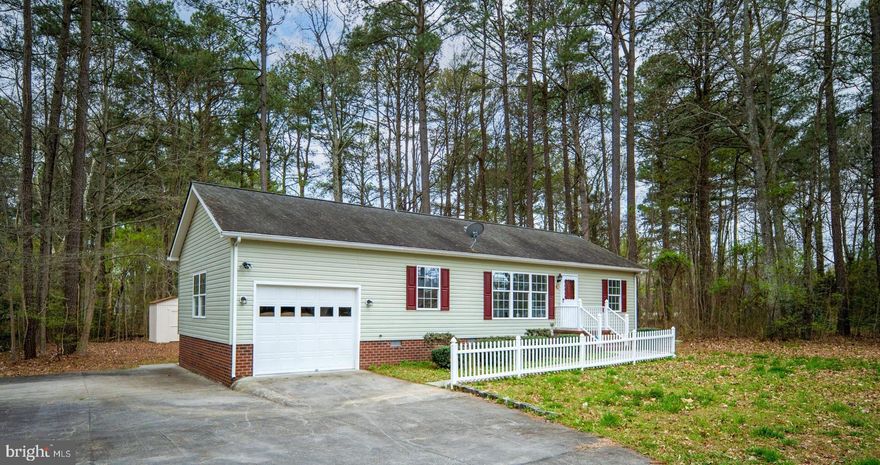 Potomac River and Machodoc Creek water-access living awaits in the desirable Cabin Point community of Montross, VA.  Located on a quiet cul-de-sac, 67 Stern Way offers a well-maintained, low-maintenance home in a peaceful setting.  This home features a comfortable living room, a beautiful kitchen, a dining area with access to the sunroom, plus an oversized garage, ideal for boat storage, tools, or weekend gear.  With generous outdoor paved parking, there's room for water toys, trailers, or guest vehicles.  Just minutes away are Cabin Point's community amenities, including multiple boat ramps, sandy beaches, a pool, tennis courts, picnic areas, and more.  Whether you're searching for a full-time residence, weekend getaway, or value-priced second home, this property delivers access to the waterfront lifestyle in a move-in-ready home.  Enjoy boating, fishing, and relaxed coastal living in one of Westmoreland County's most established water-oriented communities.  Priced to offer exceptional value for its location, amenities, and excellent condition.