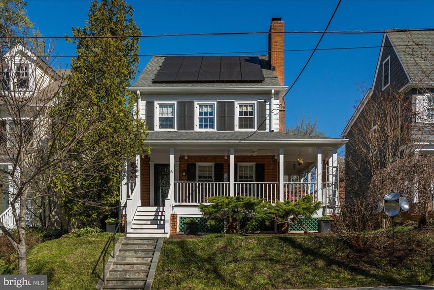 *** Charming Home in Sought-After AU Park *** Welcome to 4445 Faraday Place NW, a beautifully maintained3BED/2BA home nestled on picturesque, tree-lined Faraday Place NW. This inviting residence blends classic charm with modern convenience, offering easy access to two Red Line Metro stations for seamless city living. Step onto the delightful wraparound front porch—perfect for morning coffee or evening relaxation. Inside, hardwood floors and abundant natural light create a warm and welcoming atmosphere. The thoughtfully designed galley kitchen features a cozy coffee nook and pantry area. Three generous bedrooms and a hall bath with tub complete the second level. The lower level provides a versatile flex space - ideal for a guest suite, home office, gym - as well as a full bath, laundry and access to the attached garage and rear yard. Outside, the well-manicured backyard offers a private retreat. Not only is this home move-in-ready and beautifully maintained, but it also boasts state-of-the-art solar panels, designed to reduce  electricity bills while lowering the carbon footprint. It's the perfect balance of comfort and sustainability! Welcome home!