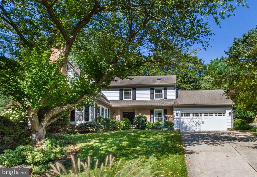 Wonderfully updated & meticulously maintained 5BR/4.5BA River Falls home! Large central foyer, hardwood flooring & crown molding throughout. Fabulous family room w/fireplace opens to kitchen and French Doors lead to the backyard! Gourmet kitchen with eat-in dining space, pantry/mud room connecting to 2-car garage & amazing screened-in porch. Main level study and an oversized living room/second family room!  Hardwoods continue upstairs with Master suite including a large walk-in closet & gorgeously remodeled Master bathroom. Generously sized bedrooms all and all bathrooms recently renovated! Ideal upper level laundry room! Fully-finished lower level with walk-out access, recreation room, fireplace,5th bedroom, full bath & storage! Flat and grassy backyard with pretty wooded views & patio! River Falls offers a neighborhood pool, tennis programs, playground, Forth of July parade & more!