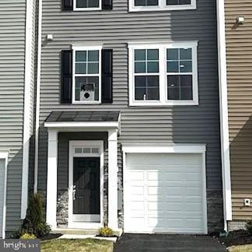 IMMEDIATE DELIVERY!!  ***OFFERING UP TO $8500 IN CLOSING ASSISTANCE WITH THE USE OF PREFERRED LENDER AND TITLE***CONTACT CO-LISTING AGENT FOR ADDITIONAL INCENTIVES.Berkeley County’s premier planned community featuring a clubhouse, swimming pools, walking trails, lush landscaping and mountain views. The Darlington II, 3 level interior townhome with 1 car garage featuring 3 Bedrooms and 3.5 Baths. The covered front porch leads directly through the front door into the spacious lower level including 9 ft. ceilings, foyer with a double coat closet, access to the garage continuing into the fully finished lower level recreation room with full bath and walkout access to rear yard with privacy fencing. This home features a 3 level morning room extension. Open concept main level with 9 ft. ceilings, luxury vinyl plank flooring throughout this level, dining room and kitchen with stainless appliances, large 8’ plus island, white mission style cabinets, quartz countertops, that leads directly into living room with powder room. The primary suite includes a tray ceiling and large walk-in closet The primary bathroom has a tiled shower and separate soaking tub with tiled decorative area.  Laundry  is located on the bedroom level.   2 Additional bedrooms and a linen closet complete this home. Home and community information, including pricing, included features, terms, conditions, availability and sales procedures related to appointments subject to change without notice. All images are for illustrative purposes only and individual homes, amenities, features, and views may differ. Images may be subject to copyright.