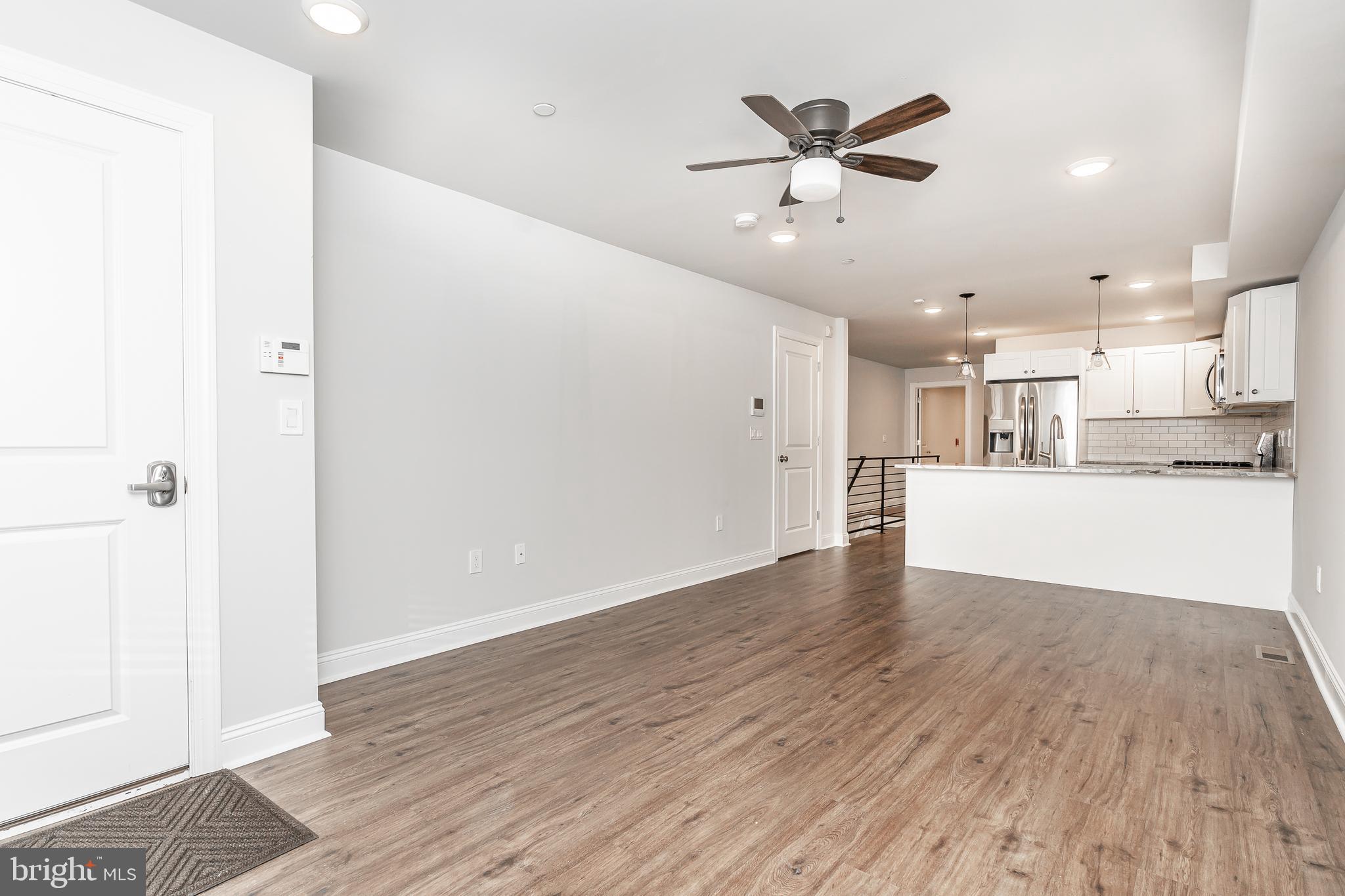 Welcome to 2141 Christian St! This stunning newer construction building in Graduate Hospital was built in 2021 and offers luxurious space at a great value. Enter the spacious unit and immediately notice the nice natural light from the large windows. Step across the fine hardwood flooring to your modern kitchen, featuring all brand new stainless appliances, granite counter tops with bar seating, and ample cabinet space. Central Air, hard-wired alarm and Video Intercom to the front entrance are just some of the many features of this unit. Unit 1 features three bedrooms with hardwood flooring, large closets and recessed lighting, and three full bathrooms which offer fantastic tile, shower and vanity. Unit 1 also has access to a private backyard. Prime Location! This property provides easy access to restaurants, shopping, schools, public transportation and much more. Easily walk to the Center City, the Broad Street Subway, Rittenhouse Square, and the Schyukill River Trail. Great access to Penn, Drexel, and CHOP. Close to I-76 and I-95 for an easy commute out of the city. Don't miss a great opportunity to live in this one of a kind building. *Photos are of a similar unit recently completed by the same Builder.*