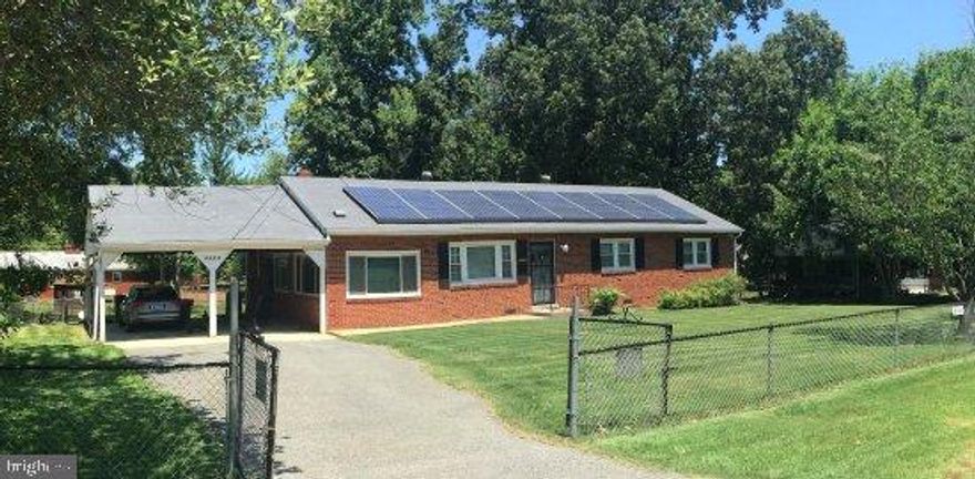 ****Brick Rambler with over 1,500 sqft.   Almost 1/2 acre lot!  Spacious rooms, newer HVAC system, energy efficient solar panels, pergola, hardwood flooring underneath carpet, fenced-in front and back yard, plus more!  Conveniently located near MD-5 (Branch Ave.), shopping, parks, and Southern Maryland Hospital.