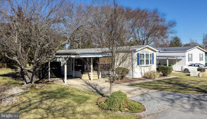 Very lovely home located in one of the best parks in Rehoboth Beach. This 2-bedroom, 2-bath, dry-walled, partially furnished, home has had several upgrades to make it your next year-round home or vacation getaway. The all-season room is bright and sunny and has its own gas fireplace. The living space is generously proportioned and has a flush mounted gas fireplace for those chilly winter months and is large enough for entertaining your guests or just relaxing. The floor plan is a split bedroom design for privacy and comfort. Each bedroom has its own en-suite full bath with walk in showers. The kitchen is fully appointed with plenty of cabinetry, and it has a separate dining room. This home has central heat/air, ceiling fans, and skylights. The park is located just minutes from the best 5-star beach in Delaware and tax-free shopping and dining but is hidden away from the hustle and bustle of traffic. This home boasts a welcoming front covered deck for your morning tea and a nice outdoor spot on those warm sunny days before you head over to the pool or clubhouse and fitness center, only a two-minute walk away. This home is not located in the municipal boundaries of Rehoboth Beach so there are no city taxes. Potential purchasers must be park approved. Investor Advisory; Rentals are not allowed in this park. This home may come furnished (with some exceptions) to make it an easy move-in ready summer retreat. This property is not within 100- or 500-year floodplain.