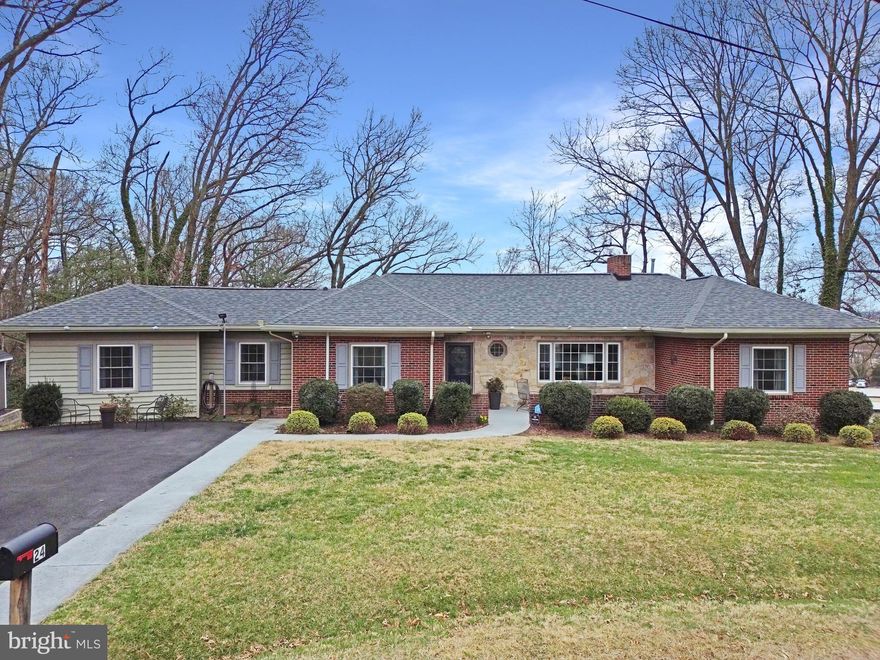 Beautiful updated Large brick rambler with finished walk out basement. 2 Fireplaces, Hardwood, huge deck, cul-de-sac quiet and privacy, ample parking asphalt drive way, newer roof of architectural grade shingles, updated double paned vinyl clad windows.  Front concrete patio with a brick surround. Public utilities, close to Fredericksburg, Shopping, services and amenities.
