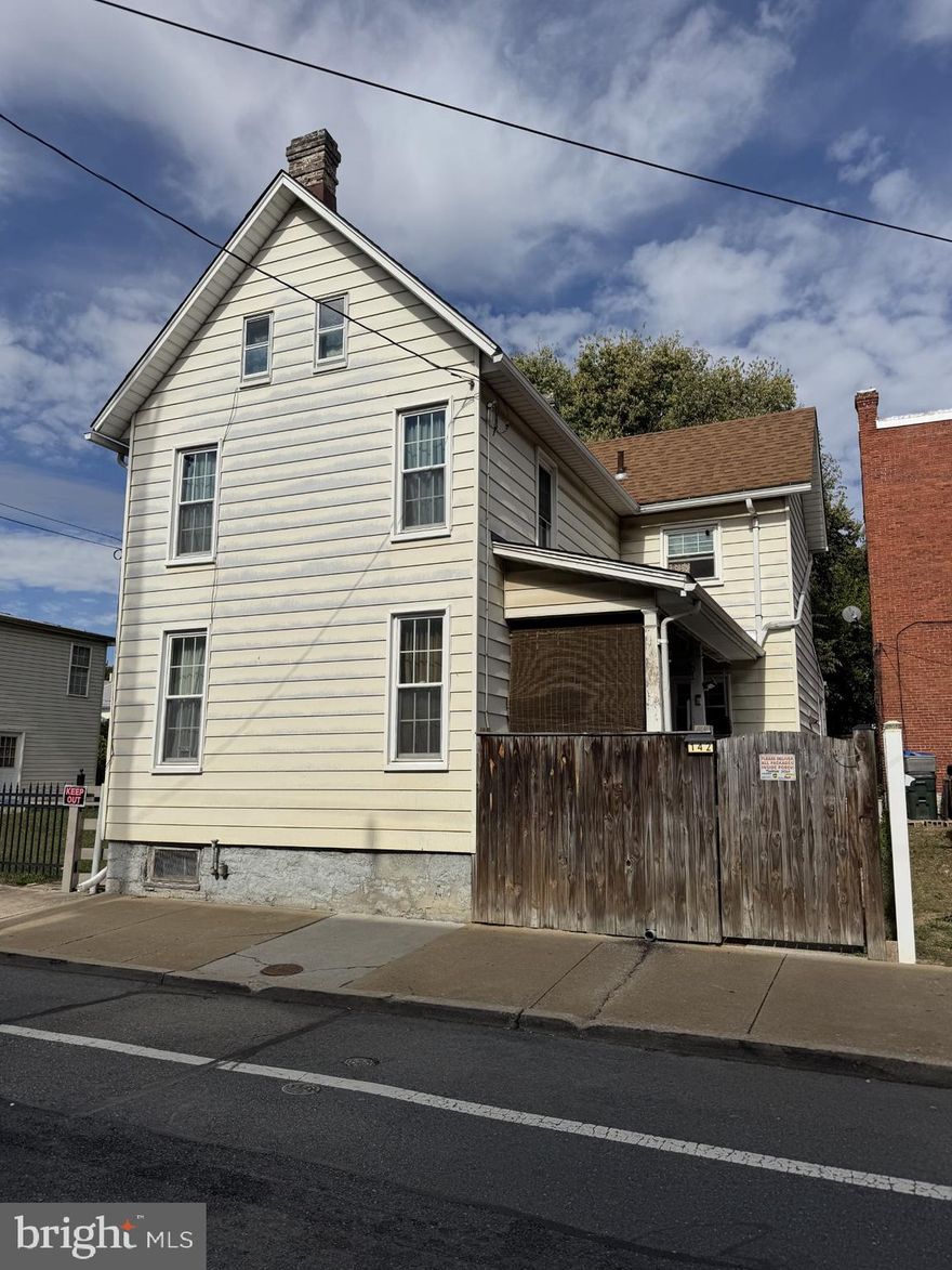 Whether you’re looking for an investment opportunity or a home to make your own, this property has plenty to offer. This home offers both comfort and convenience. Inside, you’ll find some hardwood floors, updated appliances, and replacement windows for modern efficiency. The attic provides potential to be finished for additional living space—ideal for a home office, 3rd bedroom, or flex space. A 50-year shingle roof was replaced approximately 10–15 years ago, offering peace of mind for years to come. This property is full of opportunity and located  close to shopping and dining, parks, Hagerstown Municipal Golf Course, and Hagerstown Ice and Sports Complex.