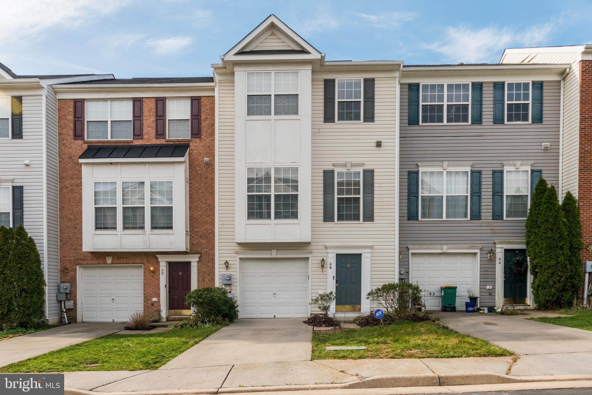 Move-in ready townhome located in the Lee's Ridge Community. This townhome has 3 bedrooms, 2 full baths and 2 half baths with over 1,900 square feet. Enter on the lower-level foyer which contains the 1 car garage as well as laundry area and unfinished space that you could make into an extra bedroom, office, or living area that has access to the rear patio and yard. The second level has your primary living space with a large living room and formal dining area, large kitchen with plenty of cabinets storage and pantry space, a separate dining area, and sitting area with access to the deck. The deck be a great place to start or end your day with the pastoral views and evening sunsets. The third level you'll find the Primary Bedroom with vaulted ceilings, a walk-in closet, the Primary Bathroom which features a double vanity, walk in tile shower with glass doors, and huge soaking tub. This level has two additional bedrooms, and the additional full bath. This home is conveniently located to commuter routes, shopping and restaurants.