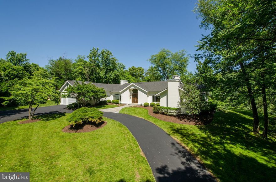 An expansive ranch in an exceptionally private setting! This unique contemporary ranch in the Saddle Ridge community sits on 2 serene acres. Enjoy an open floor plan, expansive windows w/ panoramic vistas, gracious entertaining areas, a huge finished lower level, a separate au pair suite, and a private pool. Sellers are very motivated...make this home your new home!