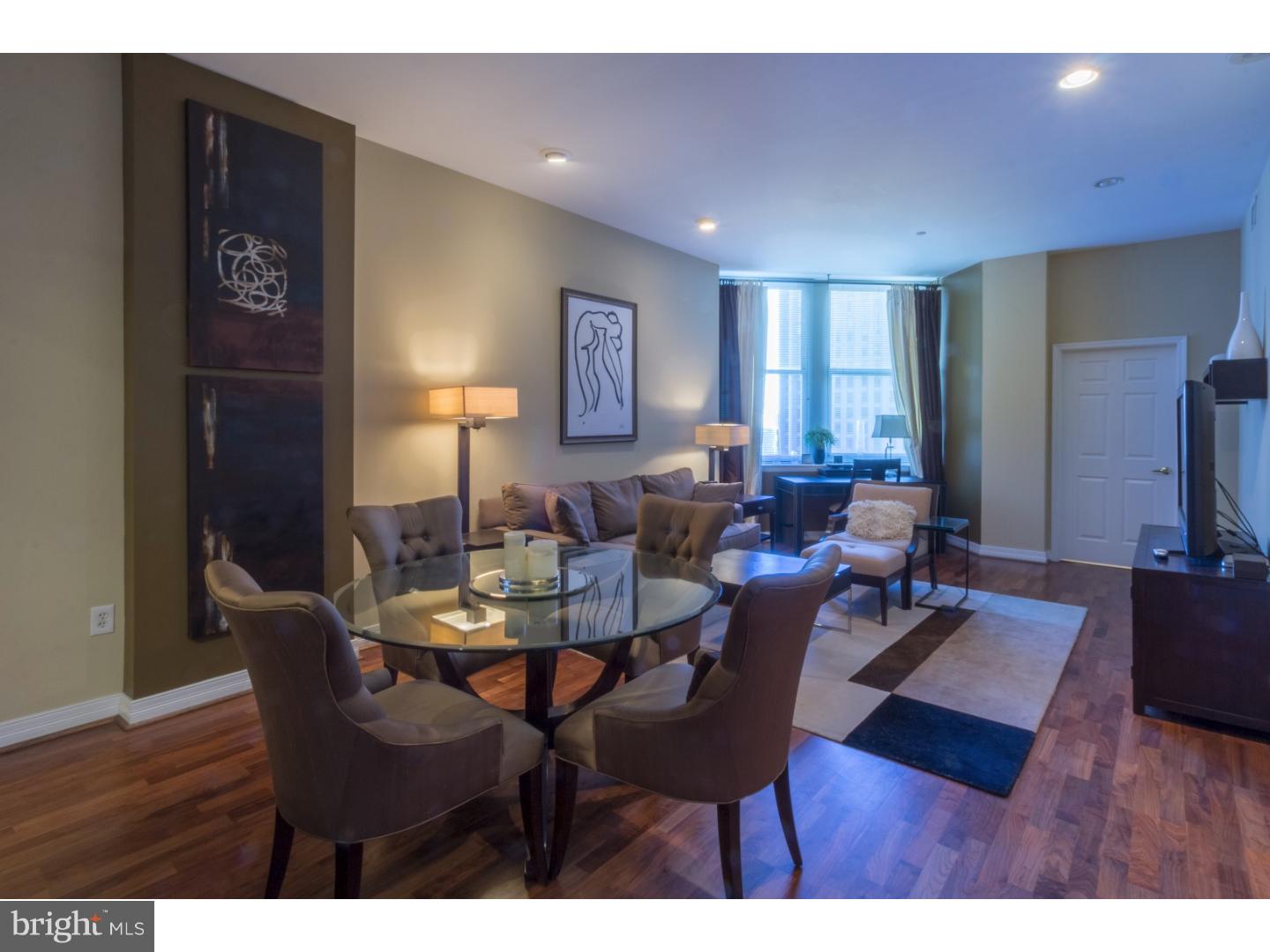 Just bring your toothbrush, everything else is waiting for you! This professionally decorated and beautifully FURNISHED 2 bedroom, 2 bath condo is available at the luxurious Phoenix. Enter in through the entry foyer with large custom coat closet. A spacious open floor plan features 9 foot ceilings, large windows with lovely city views, hardwood floors and custom California Closets throughout. The living area offers a comfortable seating area, a large flat screen tv and desk. The dining area is open to the kitchen and features a dining table with seating for four. The spacious full kitchen features granite counter tops, stainless steel appliances, dishes, utensils, pots and pans and more. Off of the kitchen you will find a laundry area with washer and dryer. This unit offers a large, beautifully decorated master bedroom with walk in closet and a spacious en suite bath. The split bedroom floor plan offers privacy and the second bedroom or den features a daybed which converts to a full bed and a second full bath. The Phoenix offers a 24 hour doorman and concierge, full sized gym, conference room, media center, rooftop terrace, direct entrance to Suburban Station, restaurants, salons, Starbucks, and more. Conveniently located to all that Center City has to offer.